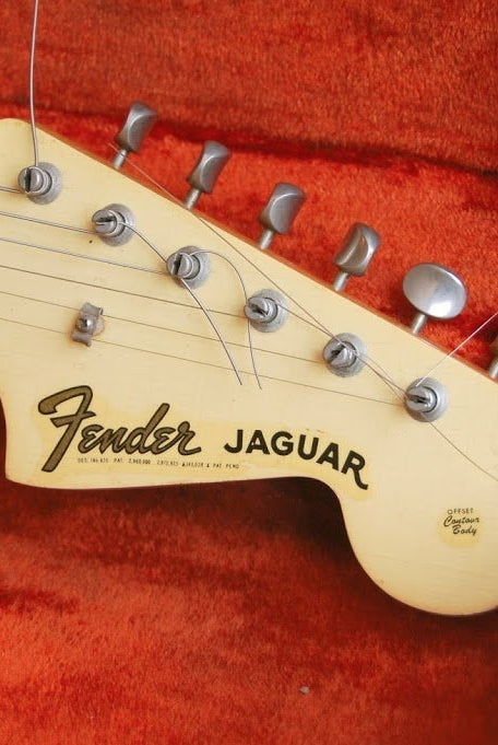 Vintage White Fender Jaguar electric guitar