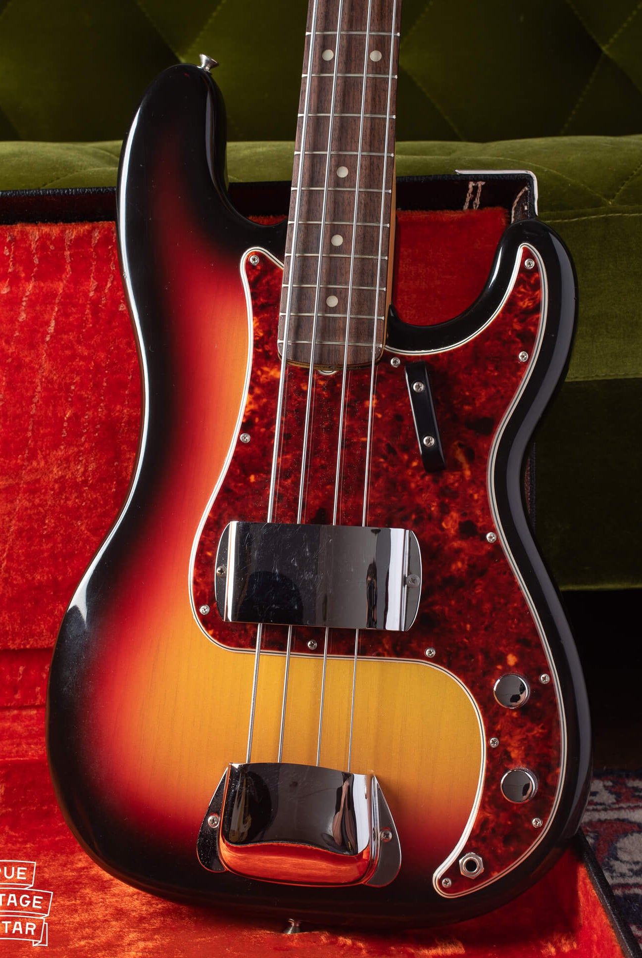Vintage 1966 Fender Precision Bass guitar with Sunburst finish