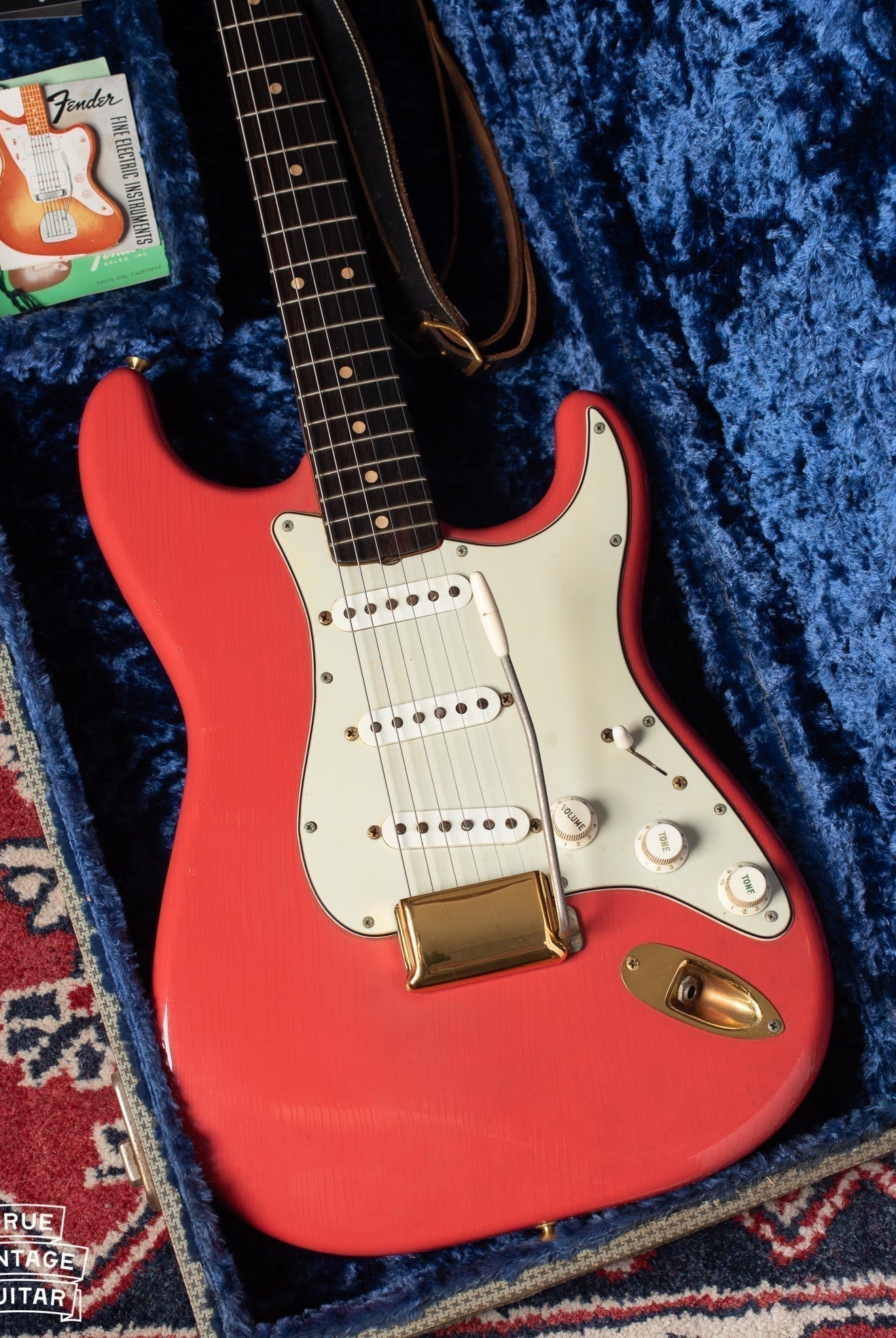This image shows one of the most valuable vintage Fender Stratocaster guitars we've had at True Vintage Guitar. The guitar is a 1962 Fender Stratocaster in original Fiesta Red finish with gold plated parts.