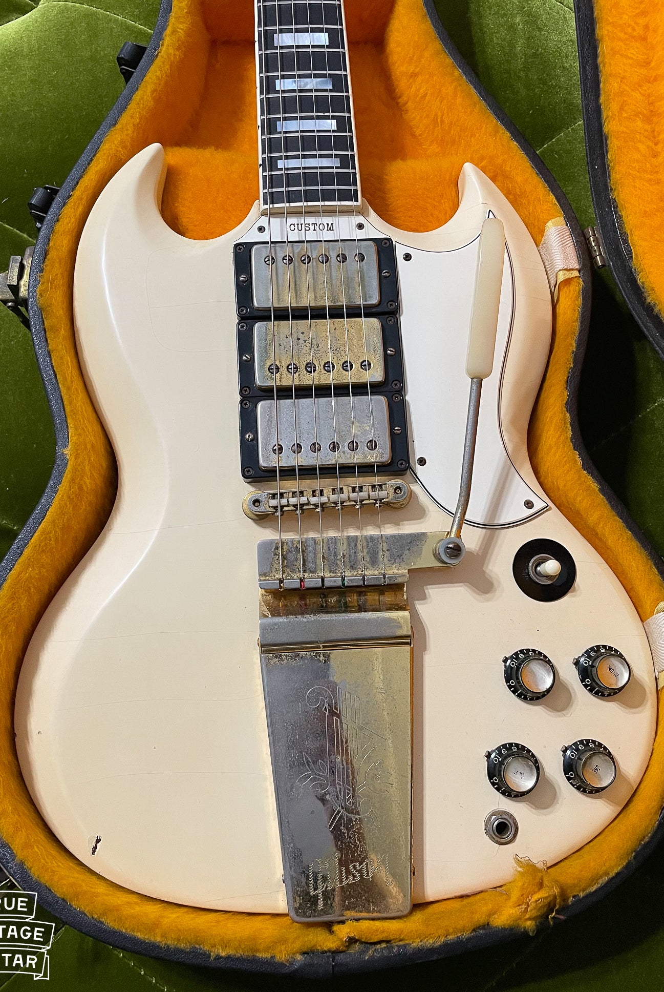 1964 Gibson SG Custom electric guitar with white finish and three pickups