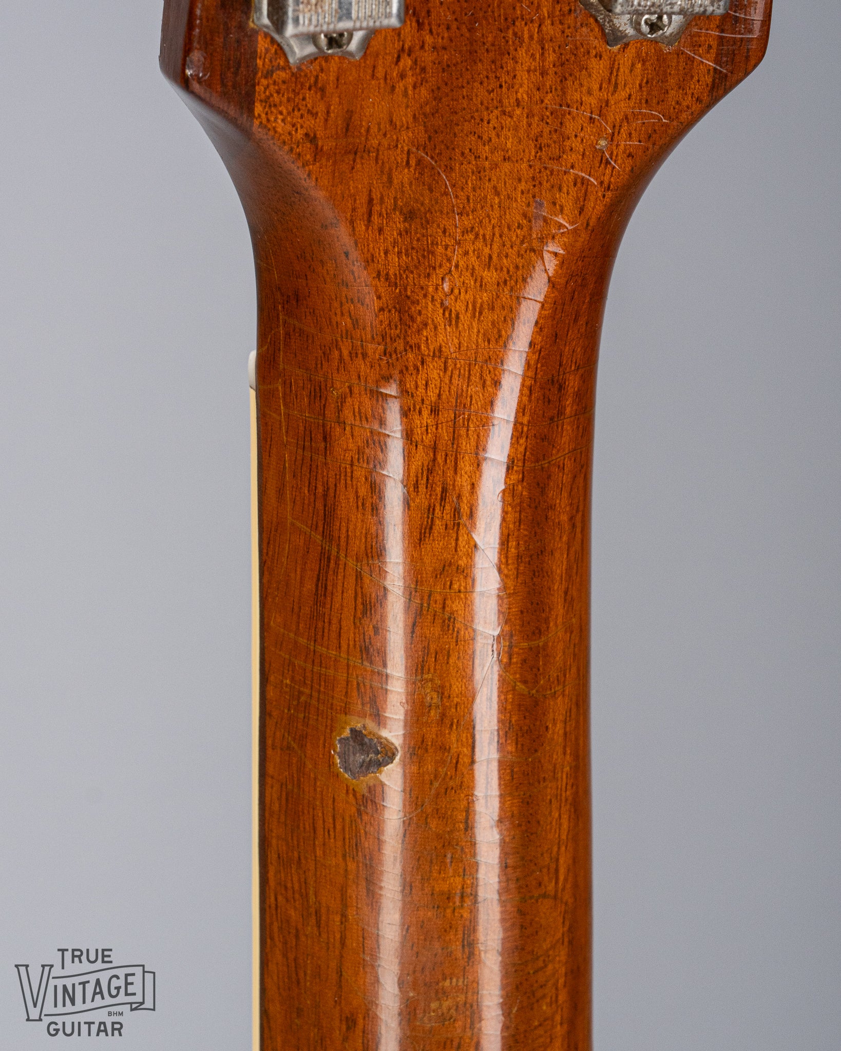 Back of 1954 Gibson Les Paul Goldtop guitar neck finish checking binding nut