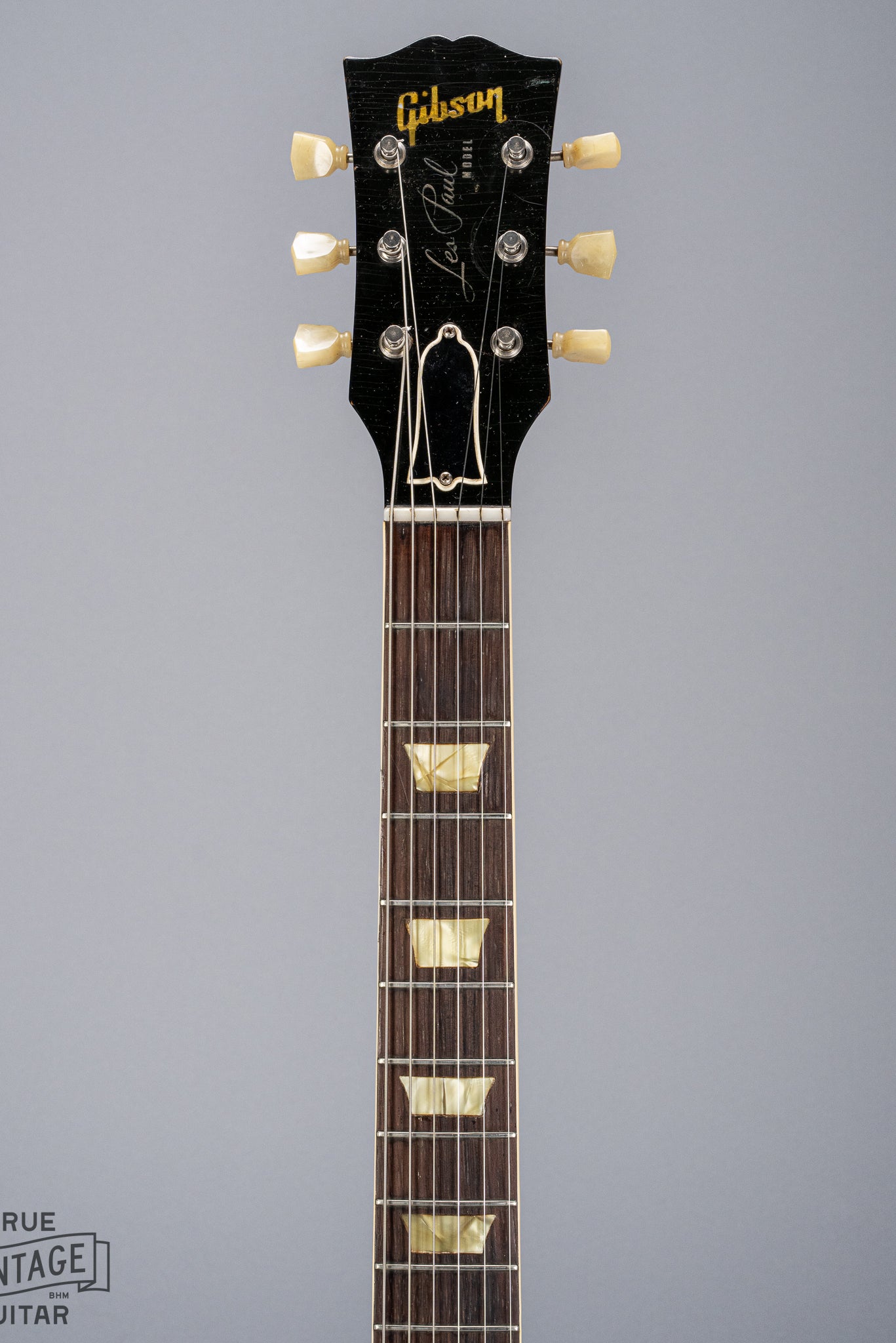 Front of 1954 Gibson Les Paul Goldtop guitar neck headstock tuners Gibson logo