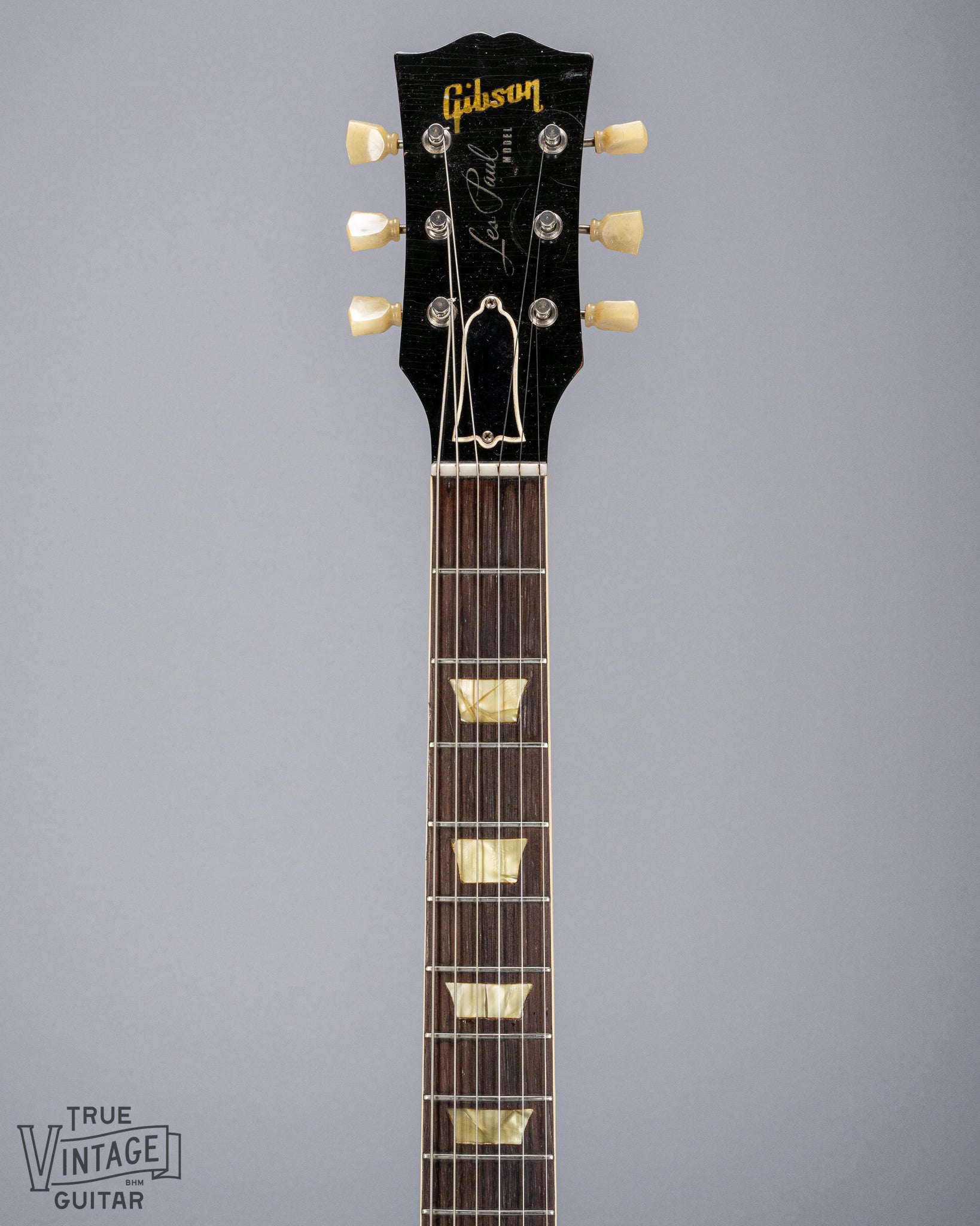 Front of 1954 Gibson Les Paul Goldtop guitar neck headstock tuners Gibson logo