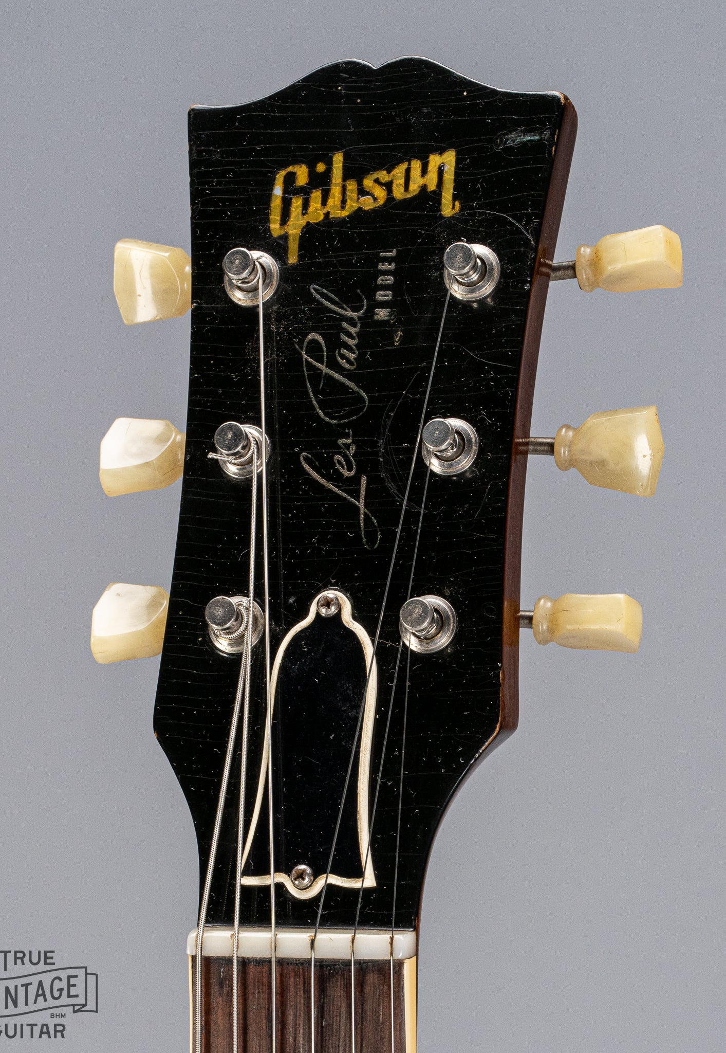 Front of 1954 Gibson Les Paul Goldtop guitar headstock Gibson logo tuners checking