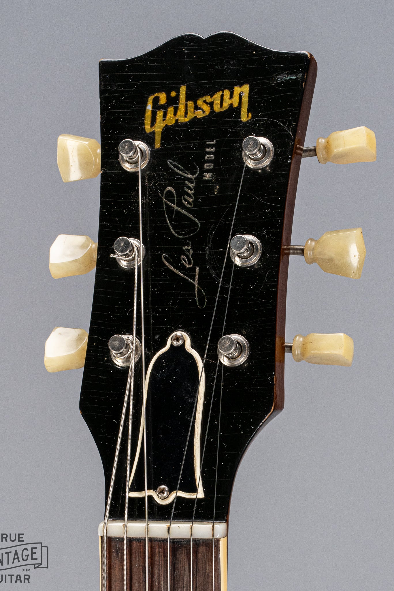Front of 1954 Gibson Les Paul Goldtop guitar headstock Gibson logo tuners checking