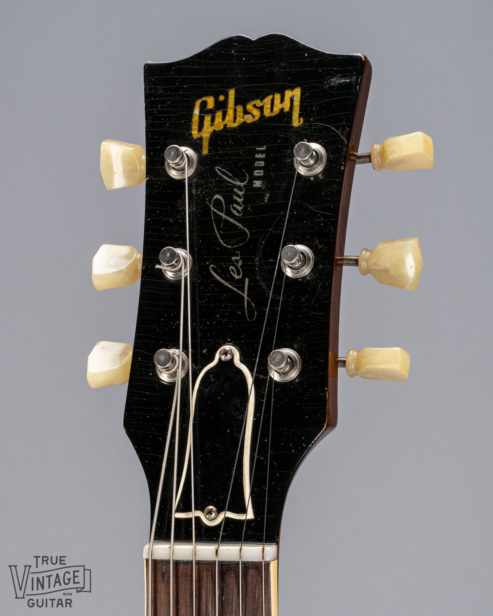 Front of 1954 Gibson Les Paul Goldtop guitar headstock Gibson logo tuners checking