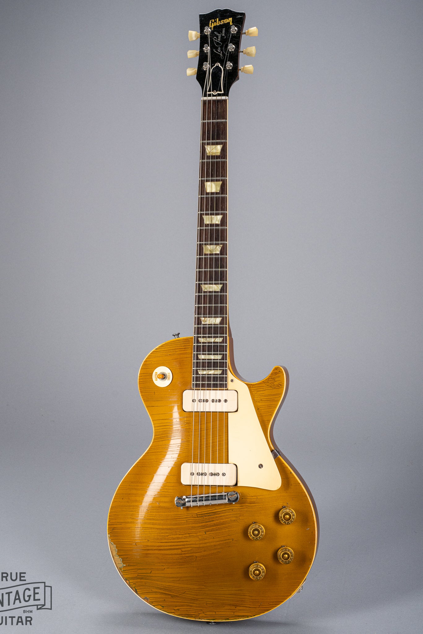 Front of 1954 Gibson Les Paul Goldtop guitar body finish checking p90 pickups neck fretboard headstock