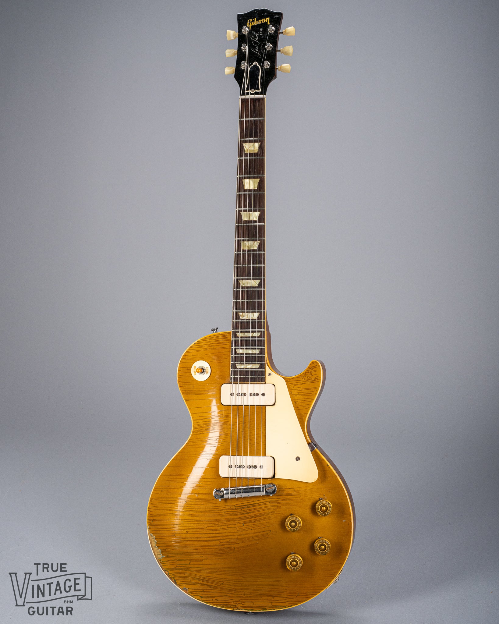 Front of 1954 Gibson Les Paul Goldtop guitar body finish checking p90 pickups neck fretboard headstock