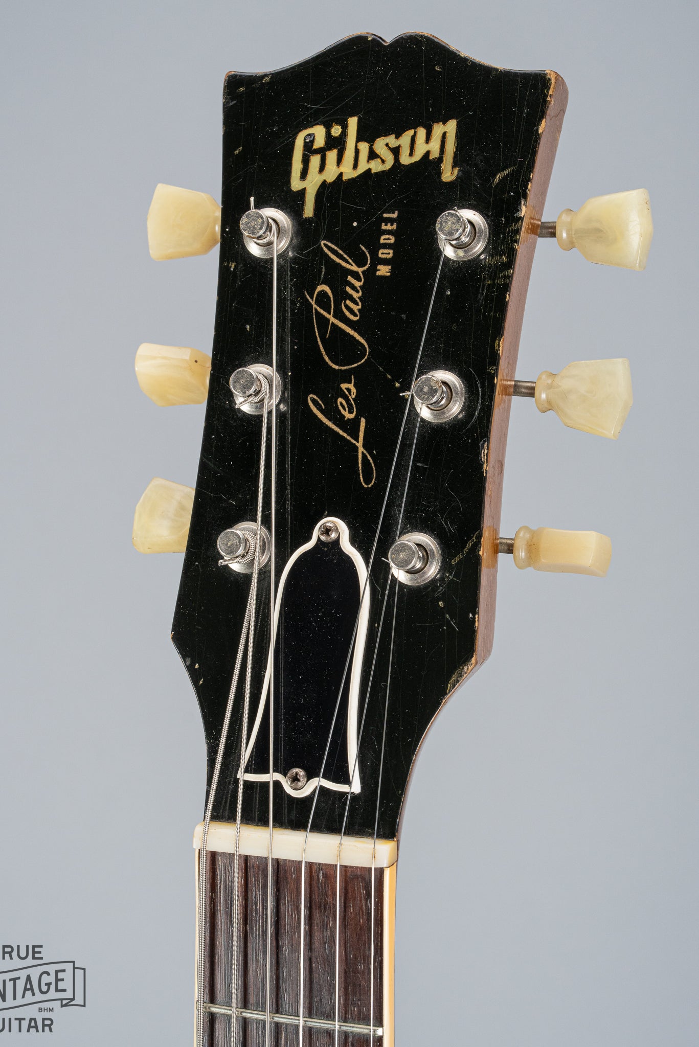 front of 1954 Gibson Les Paul Standard Goldtop guitar neck headstock logo frets