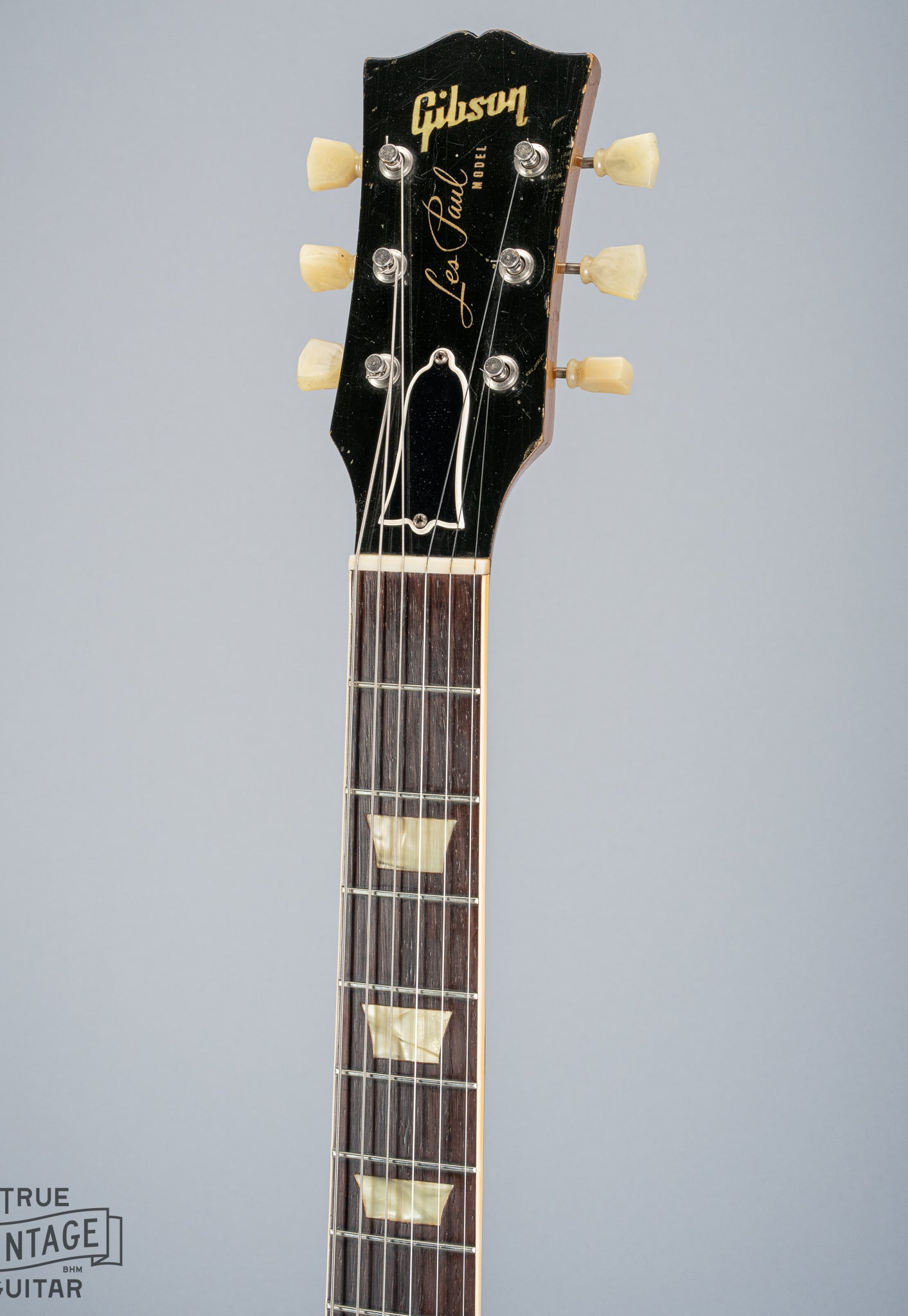 front of 1954 Gibson Les Paul Standard Goldtop guitar neck headstock logo frets