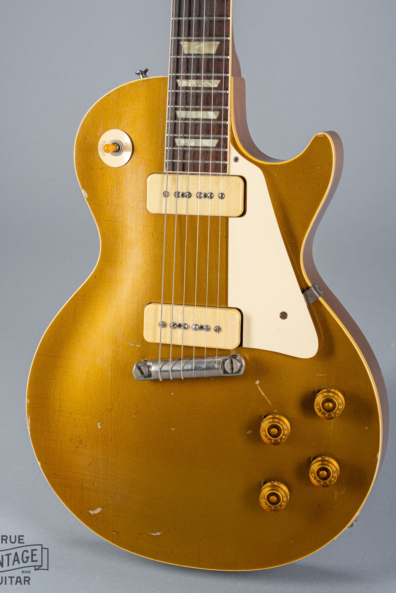 front of 1954 Gibson Les Paul Standard Goldtop guitar body p90 pickups checking  switch tip fretboard inlays binding