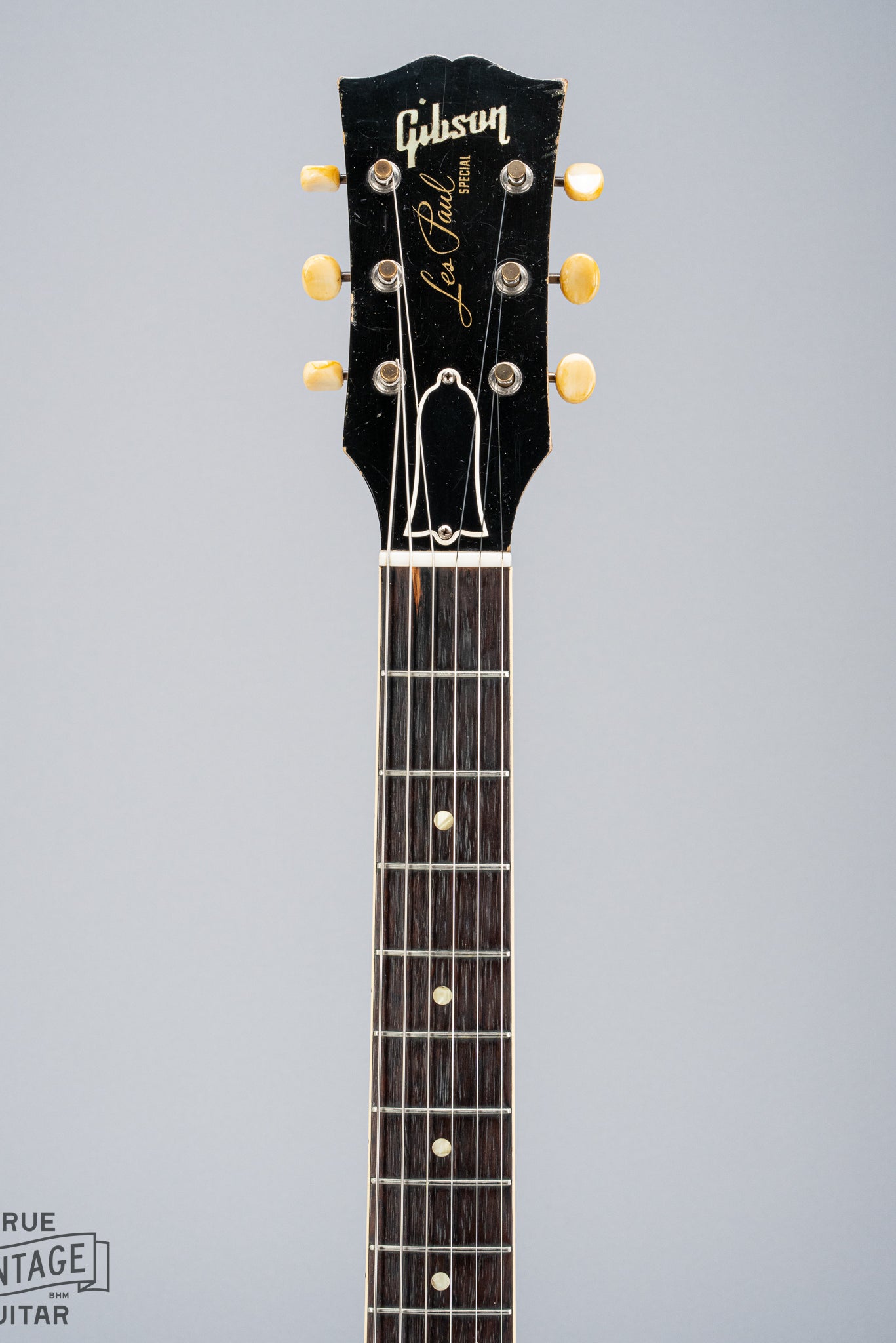 Front of 1956 Gibson Les Paul Special TV Yellow guitar neck, fretboard, headstock, Gibson logo, nut