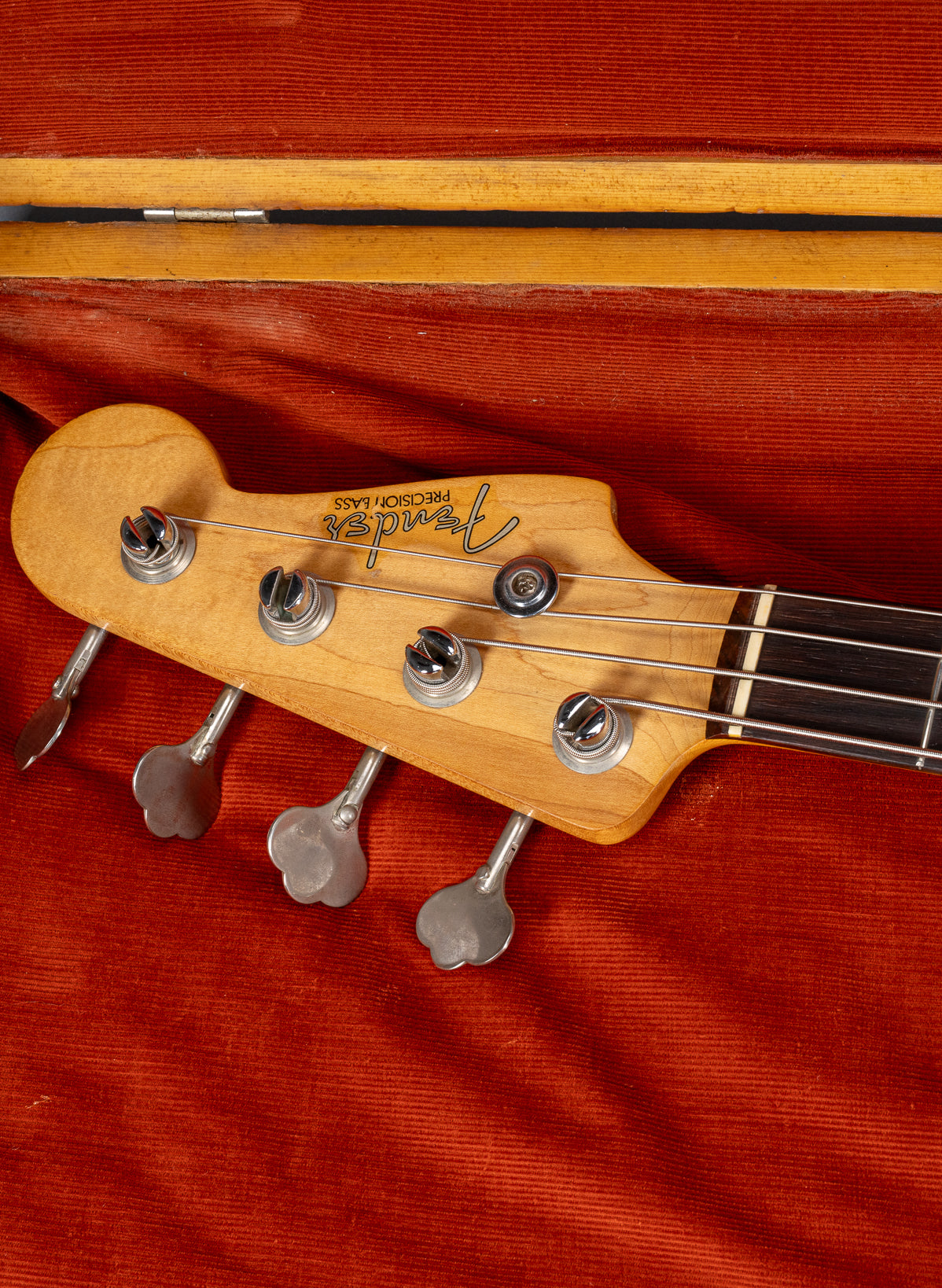 front of 1959 Fender Precision Bass P Bass Sunburst neck and headstock in custom case logo tuning machines
