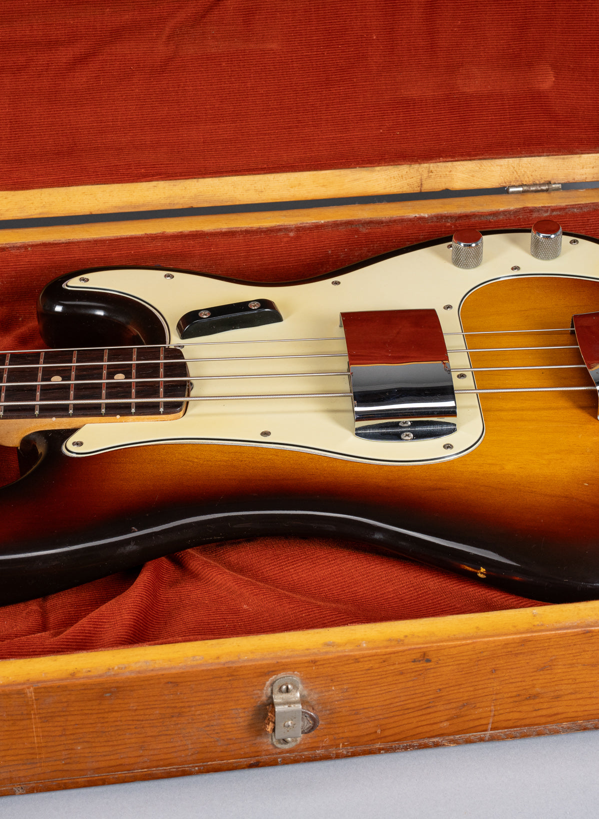 front of 1959 Fender Precision Bass P Bass Sunburst body in custom case Three Layer Nitrate Mint Pick Guard