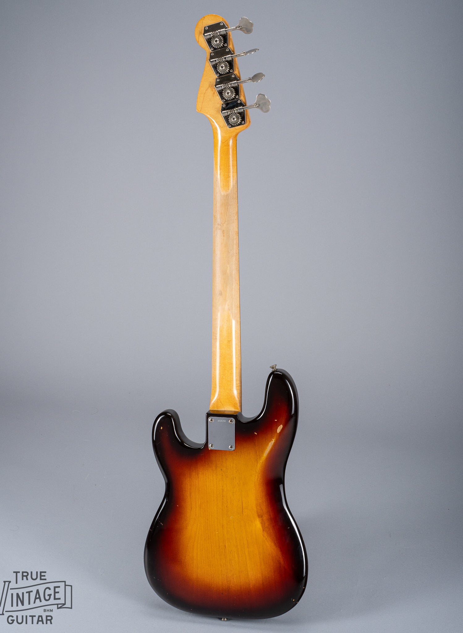 full back of 1959 Fender Precision Bass P Bass Sunburst pickguard pickup and bridge chrome cover neck and headstock neck plate