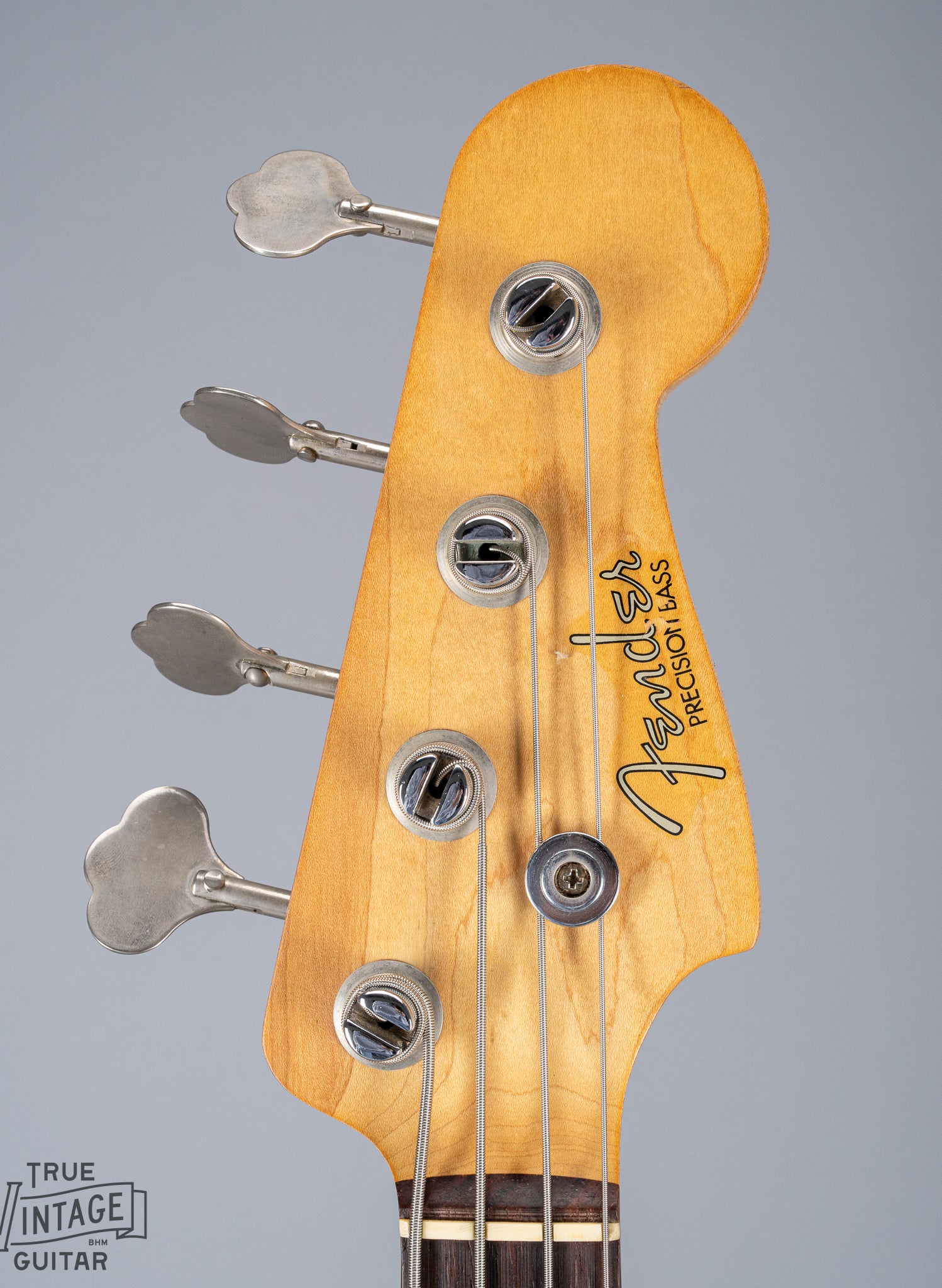 front of 1959 Fender Precision Bass P Bass Sunburst headstock and logo