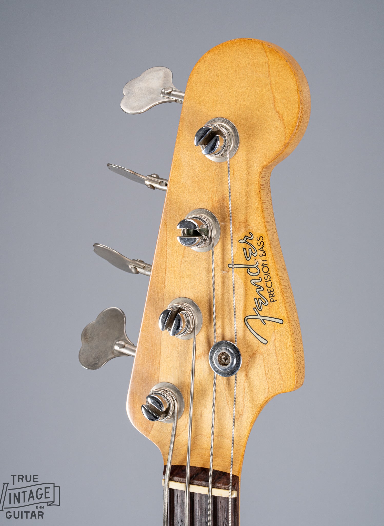front of 1959 Fender Precision Bass P Bass Sunburst headstock logo