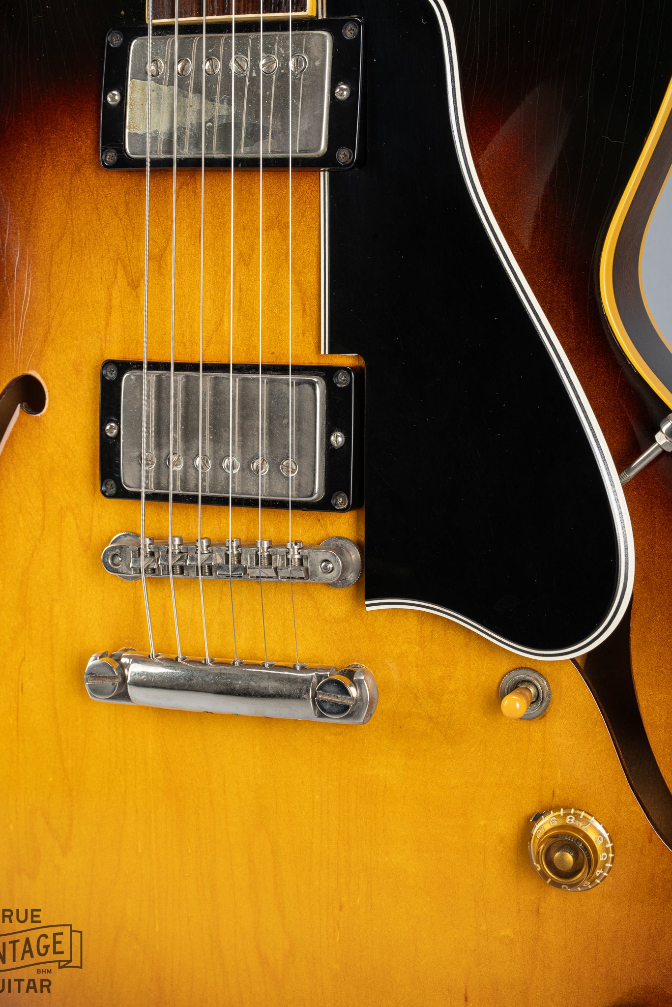 tune-o-matic bridge, stop bar tailpiece, PAF humbucking pickups, and long pickguard