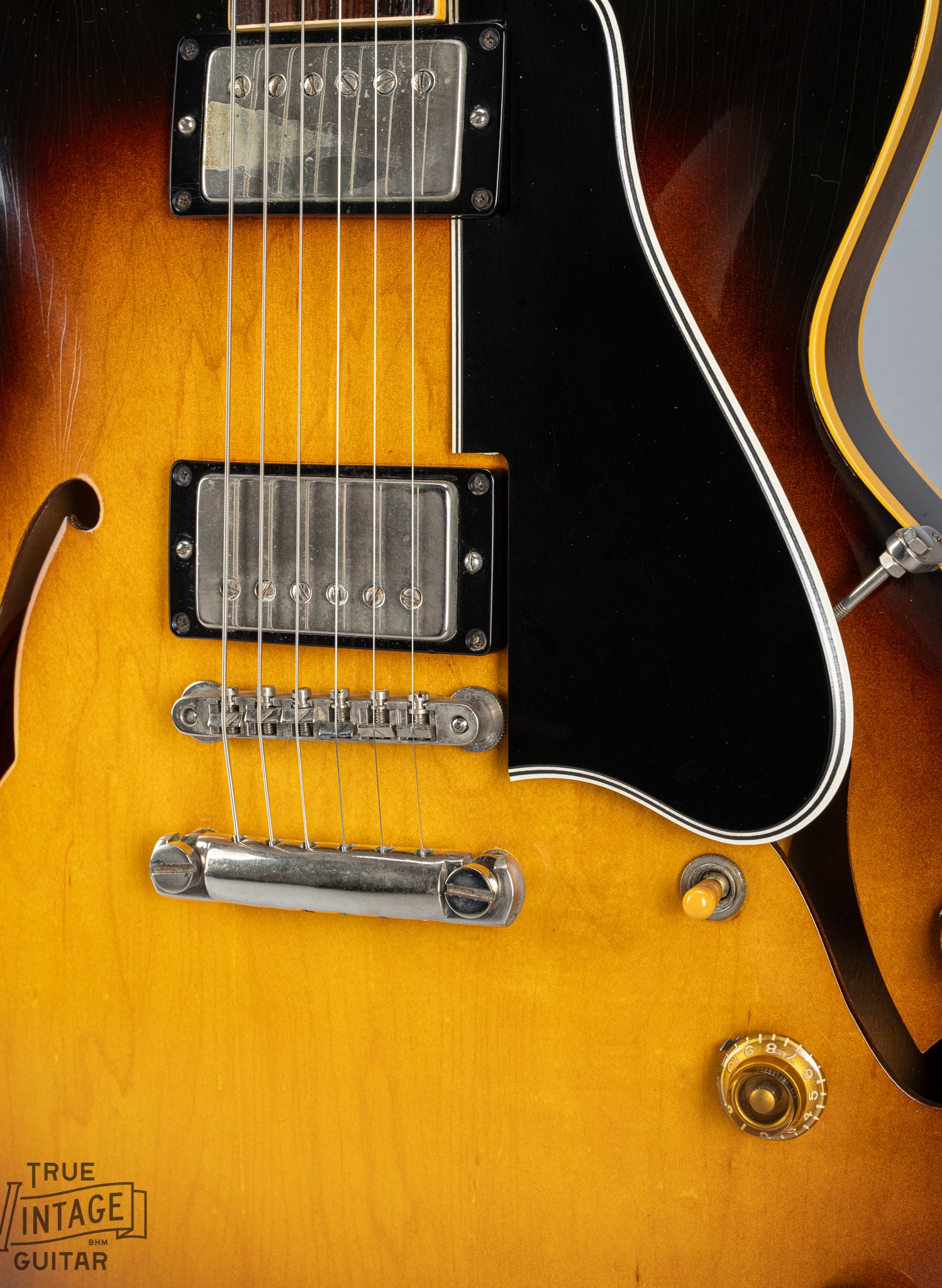 tune-o-matic bridge, stop bar tailpiece, PAF humbucking pickups, and long pickguard