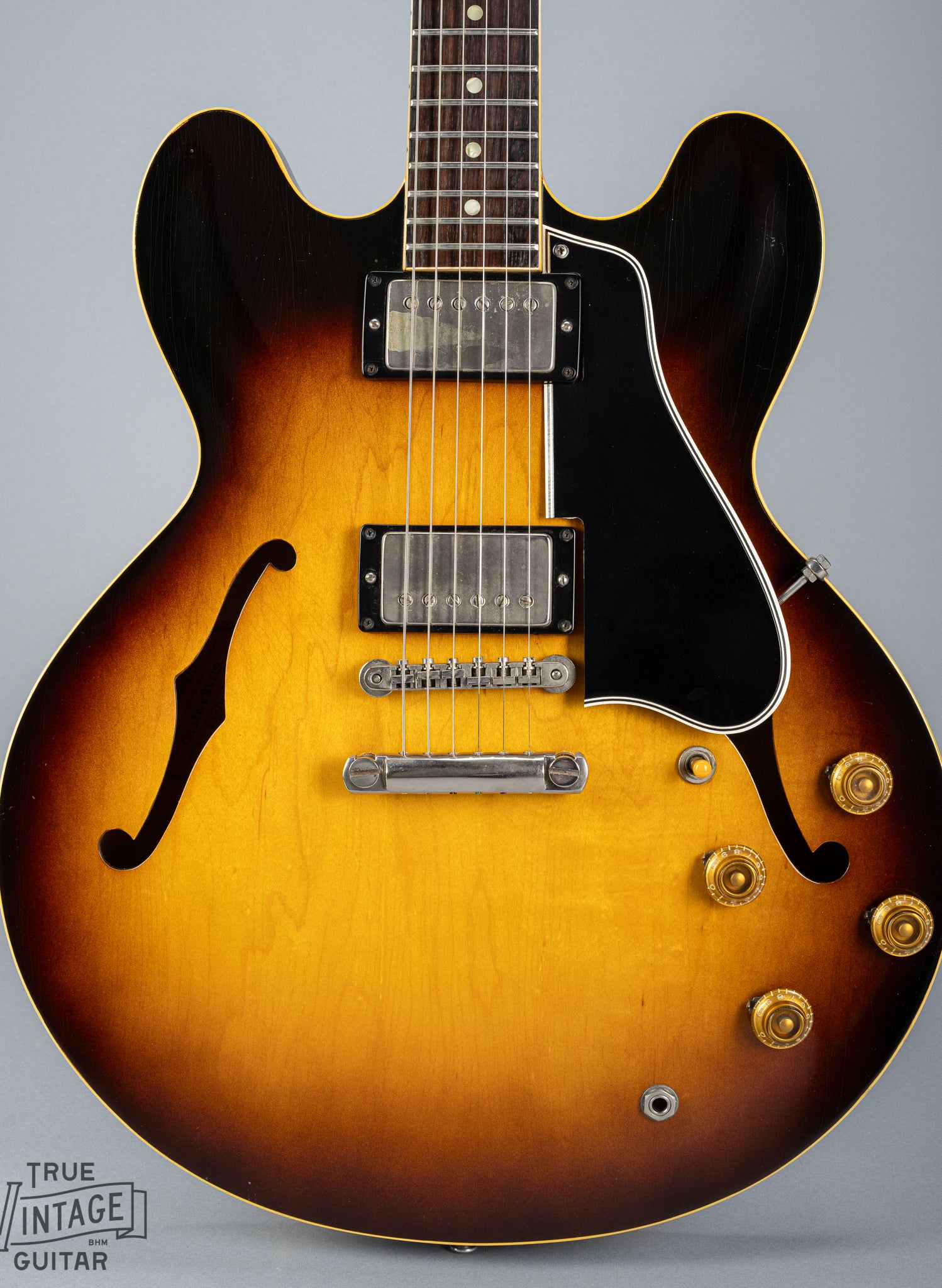 This image shows the front of the body of a 1959 Gibson ES-335 vintage guitar in original Sunburst finish with stop bar tailpiece.