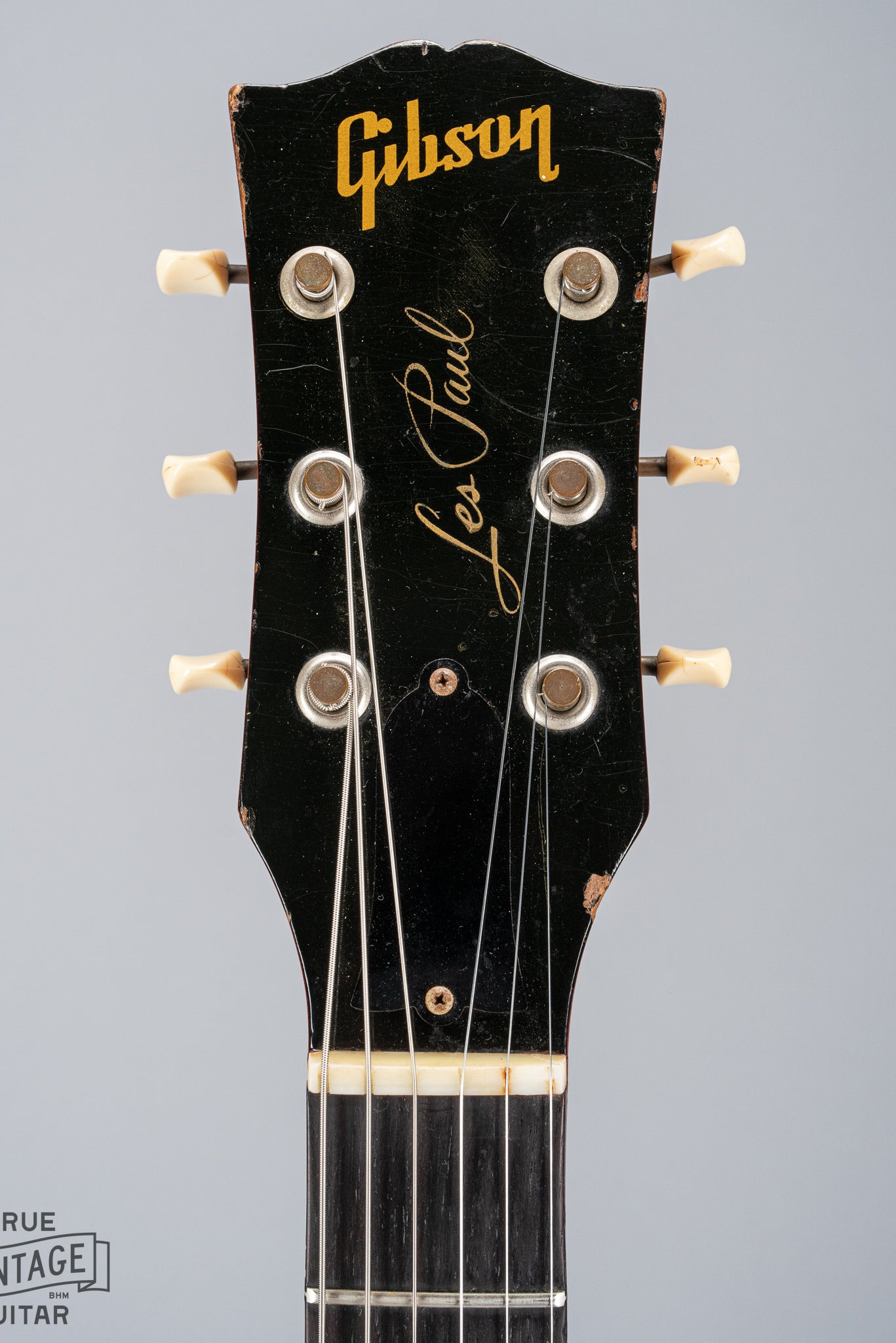 front of 1959 Gibson Les Paul Junior cherry guitar tuning machines tuner buttons logo print nut truss rod cover