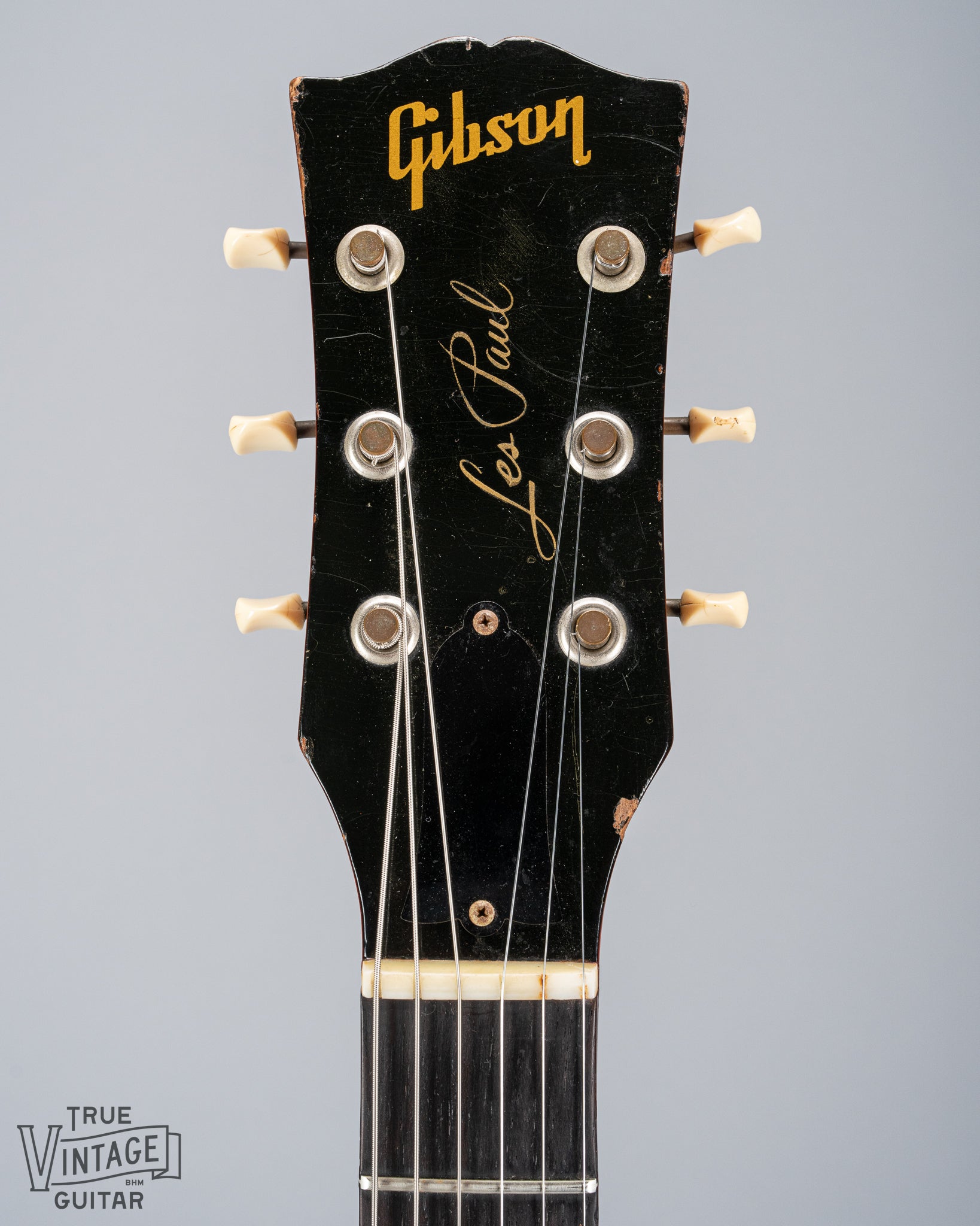 front of 1959 Gibson Les Paul Junior cherry guitar tuning machines tuner buttons logo print nut truss rod cover