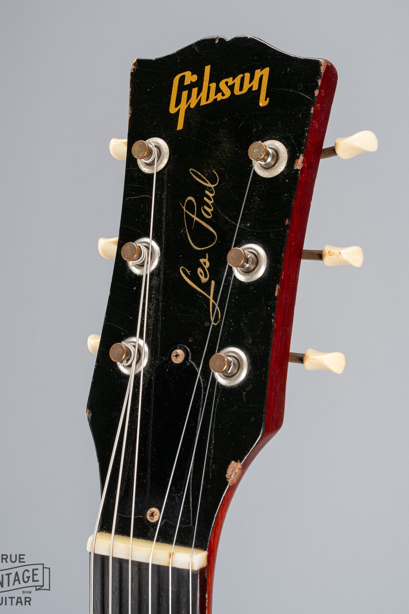 front of 1959 Gibson Les Paul Junior cherry guitar tuning machines tuner buttons logo print nut truss rod cover