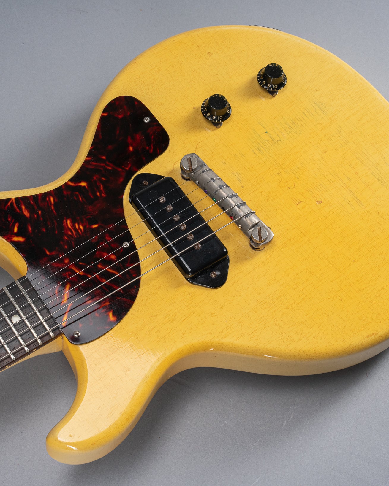 Full front of 1959 Gibson Les Paul TV Model body, neck, tortoise pick guard, dog ear p90, double cutaway, TV yellow