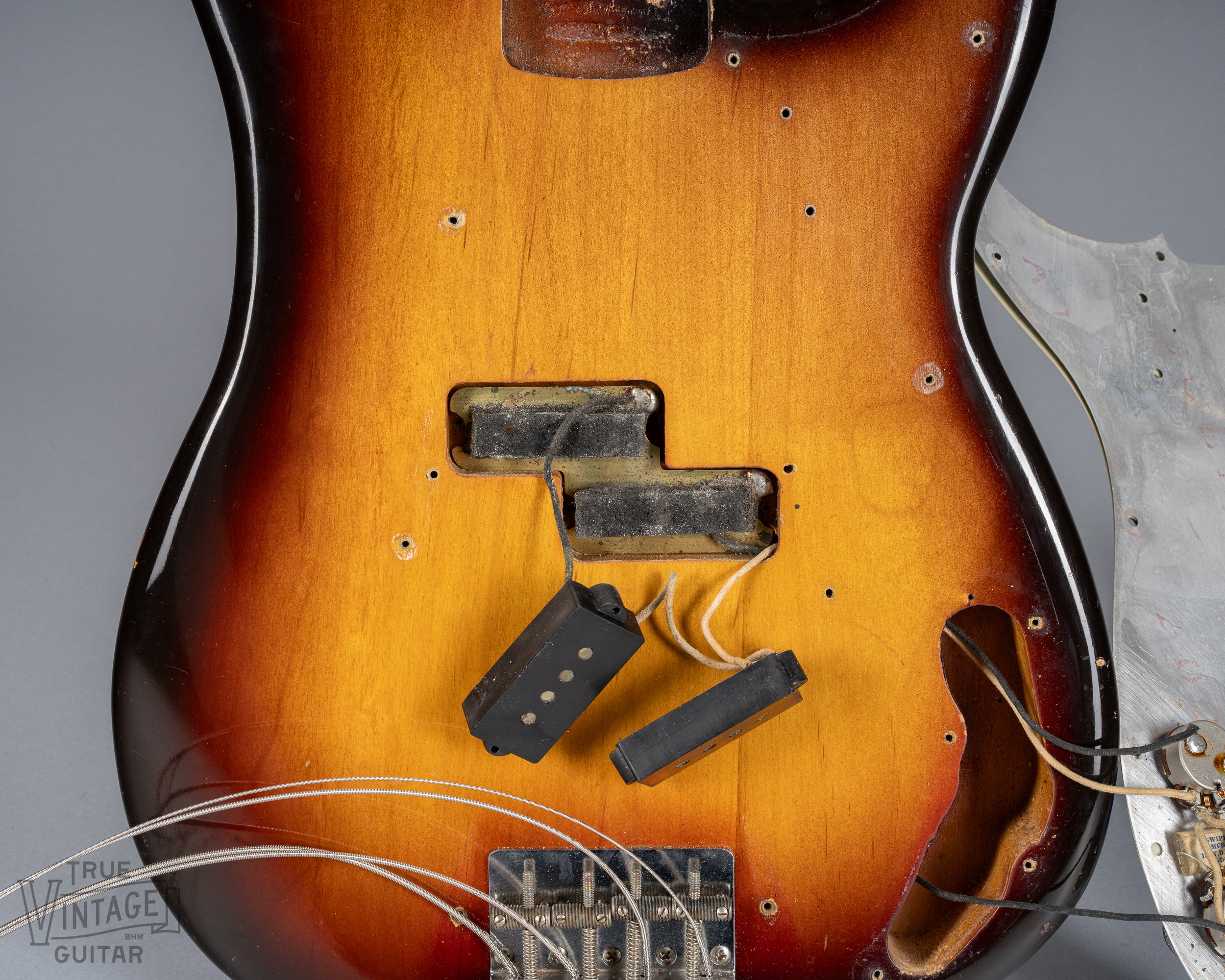 1959 Fender Precision Bass Sunburst Screw holes plating with foam pickups