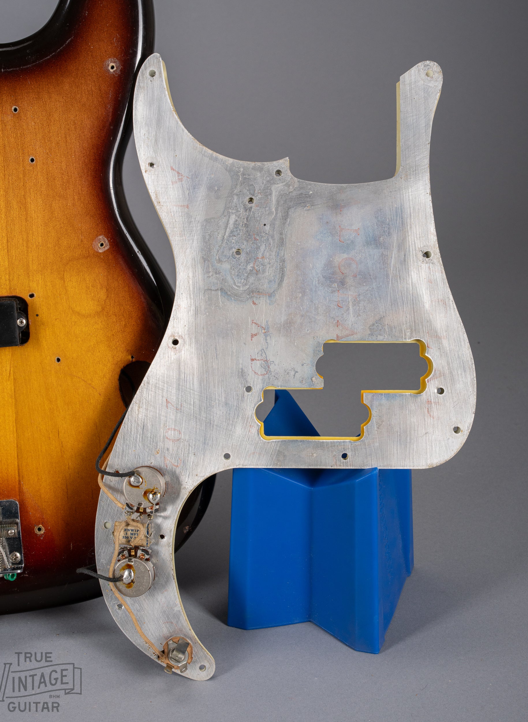 1959 Fender Precision Bass Sunburst underneath pickguard controls wiring solder pots jack screw holes three layer mint green pickguard