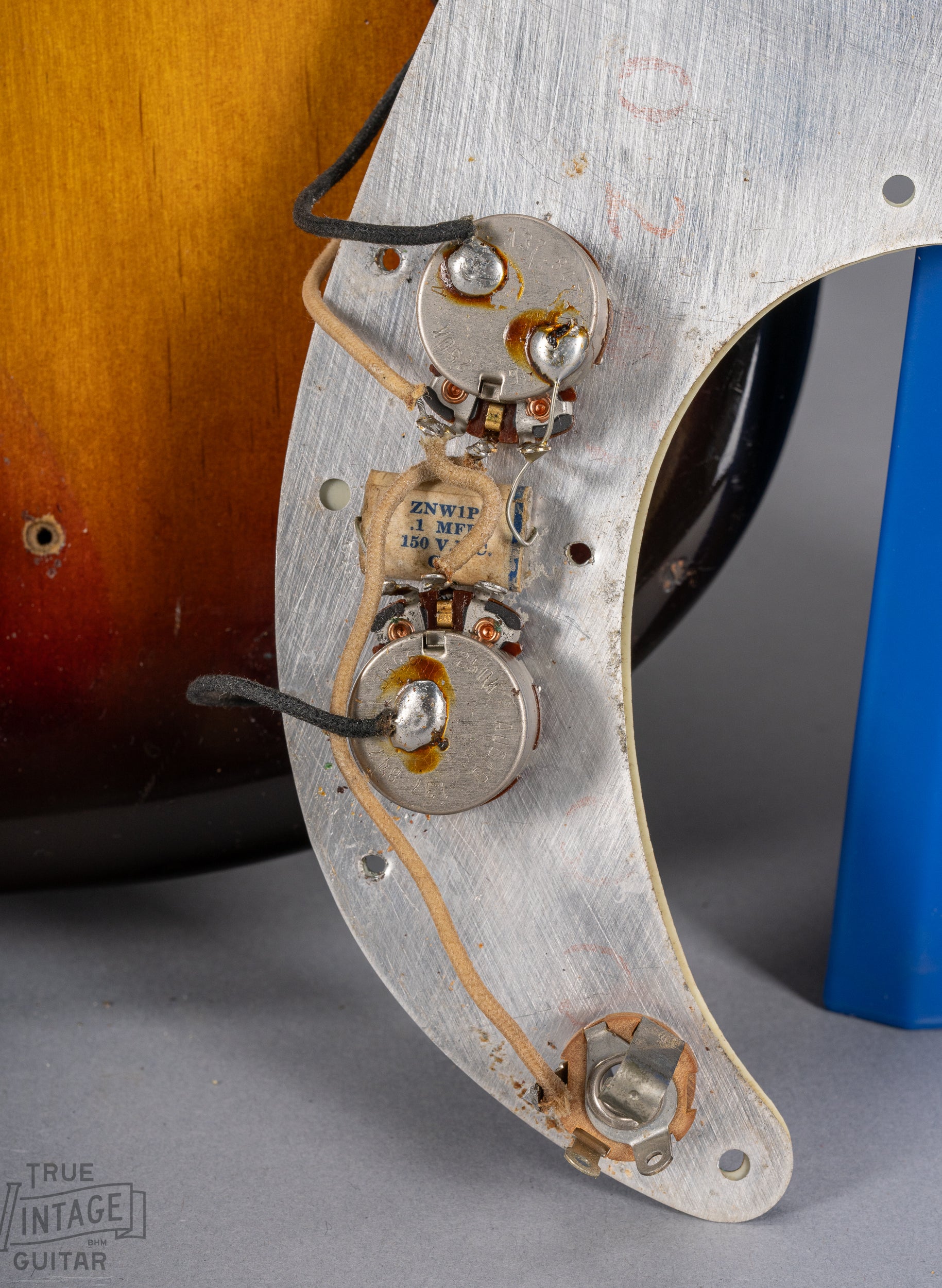 1959 Fender Precision Bass Sunburst underneath pickguard controls wiring solder pots jack screw holes three layer mint green pickguard Pot codes