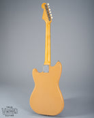 Back of 1960 Fender Musicmaster desert sand guitar body neck plate neck tuner buttons