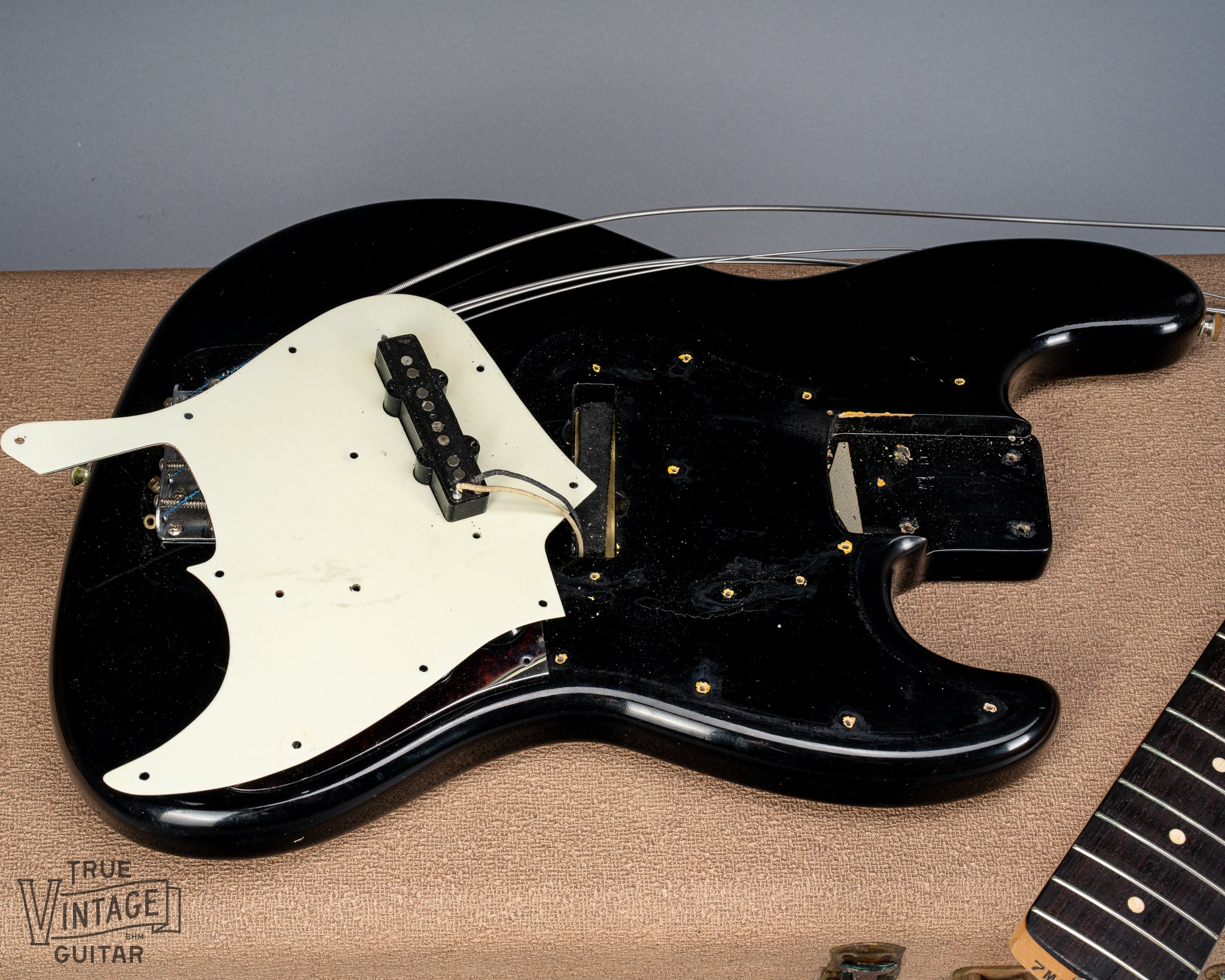 1962 Fender Jazz Bass custom color black custom color guitar tortoise shell pick guard pickup cavity neck pocket under the pickguard original pickup