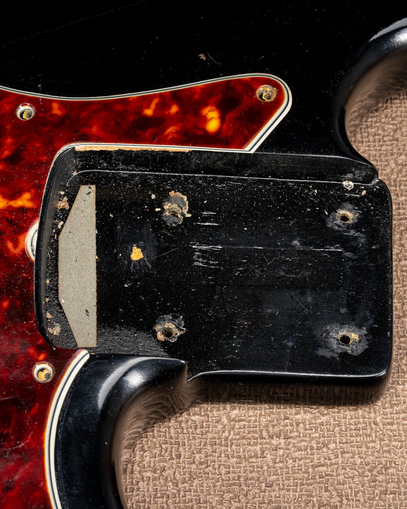 1962 Fender Jazz Bass custom color black custom color guitar tortoise shell pick guard neck pocket and screw holes