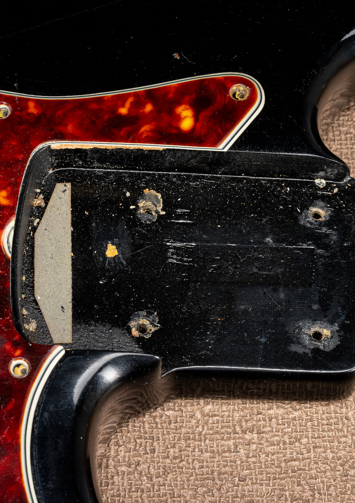 1962 Fender Jazz Bass custom color black custom color guitar tortoise shell pick guard neck pocket and screw holes