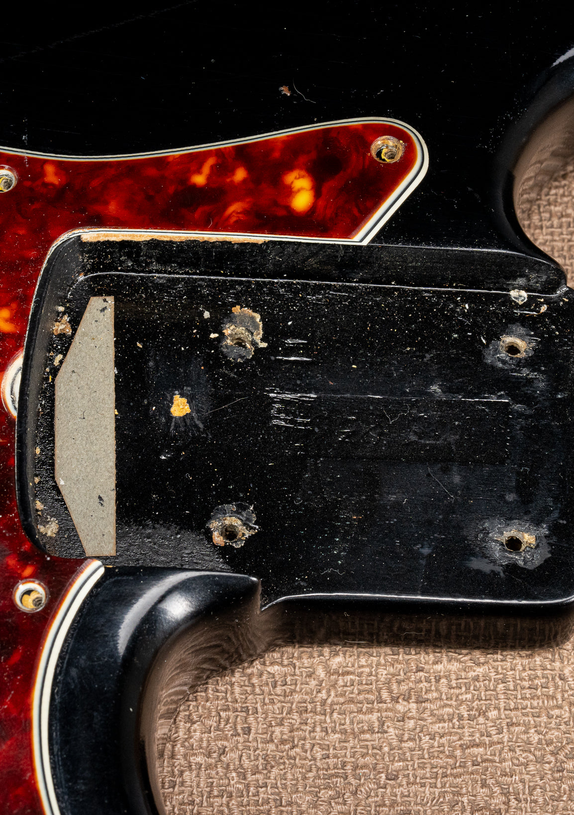 1962 Fender Jazz Bass custom color black custom color guitar tortoise shell pick guard neck pocket and screw holes