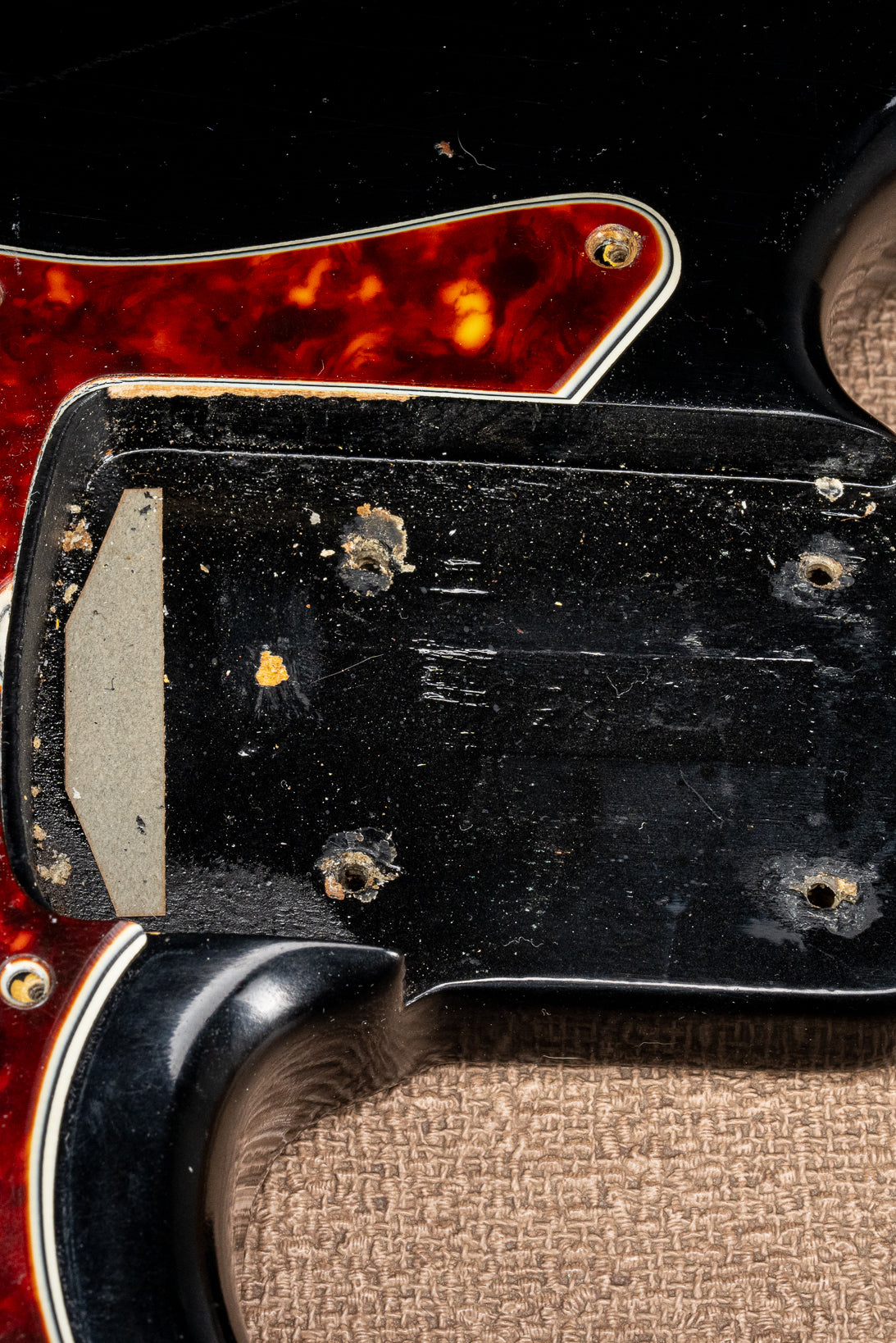 1962 Fender Jazz Bass custom color black custom color guitar tortoise shell pick guard neck pocket and screw holes