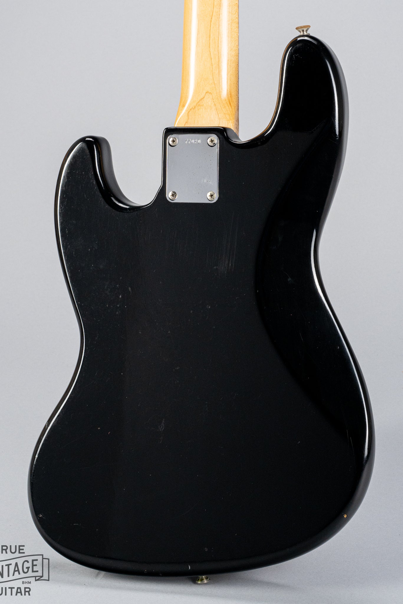 Back of 1962 Fender Jazz Bass Body custom color black bass guitar neck plate