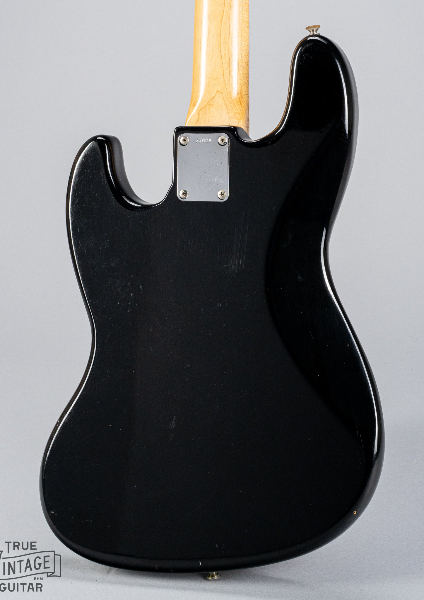 Back of 1962 Fender Jazz Bass Body custom color black bass guitar neck plate