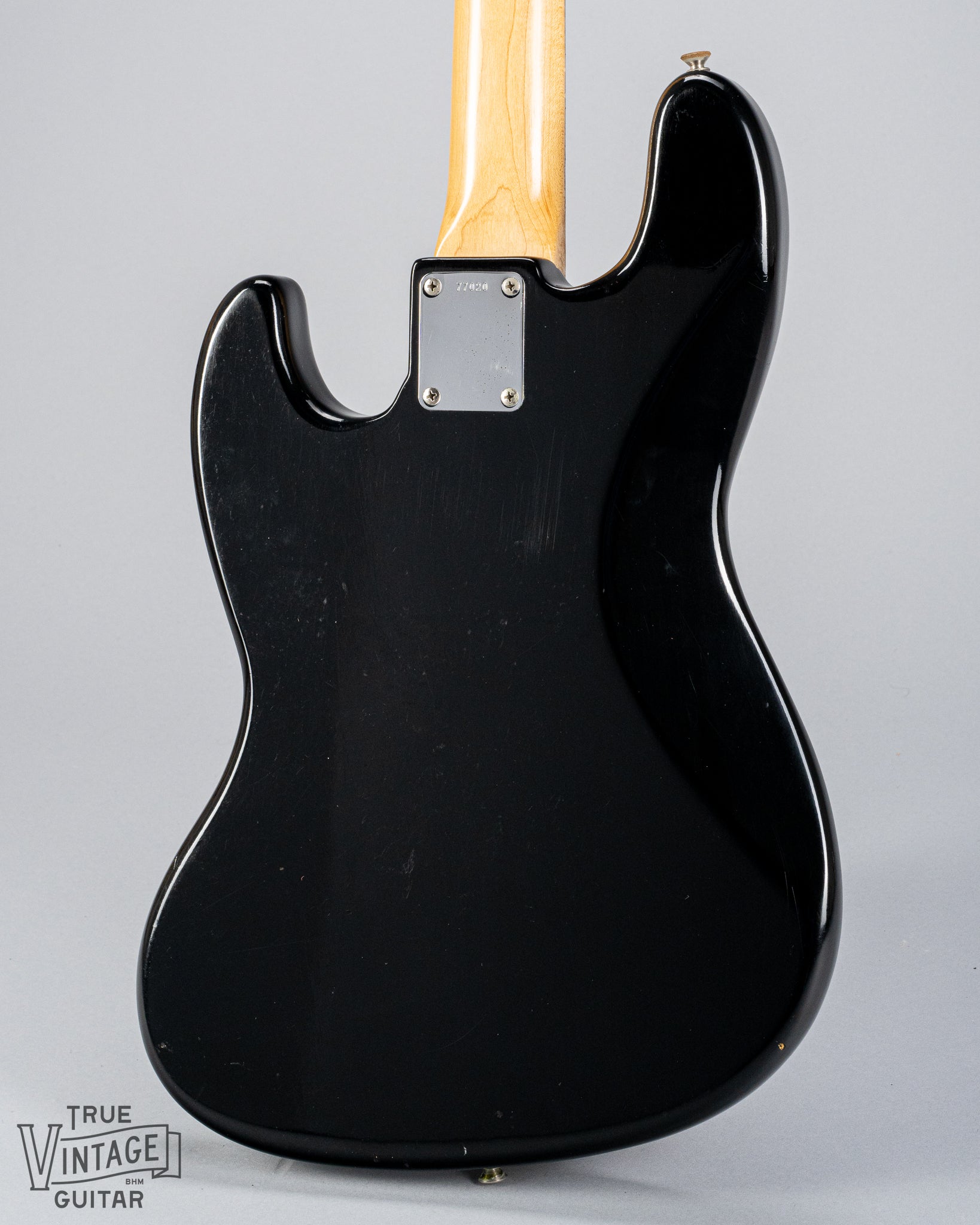 Back of 1962 Fender Jazz Bass Body custom color black bass guitar neck plate