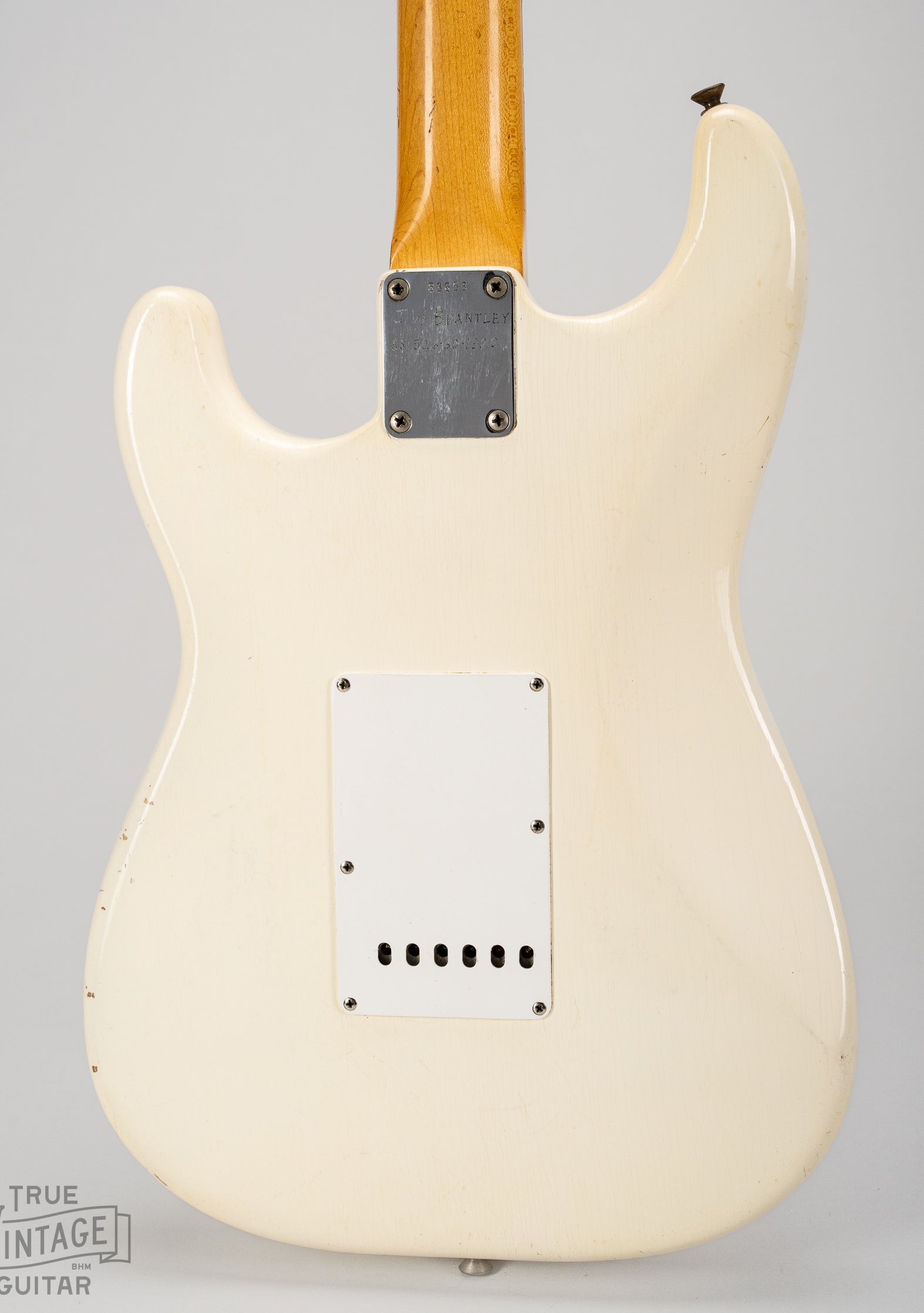 Back of the body of the 1962 Fender Stratocaster Olympic White
