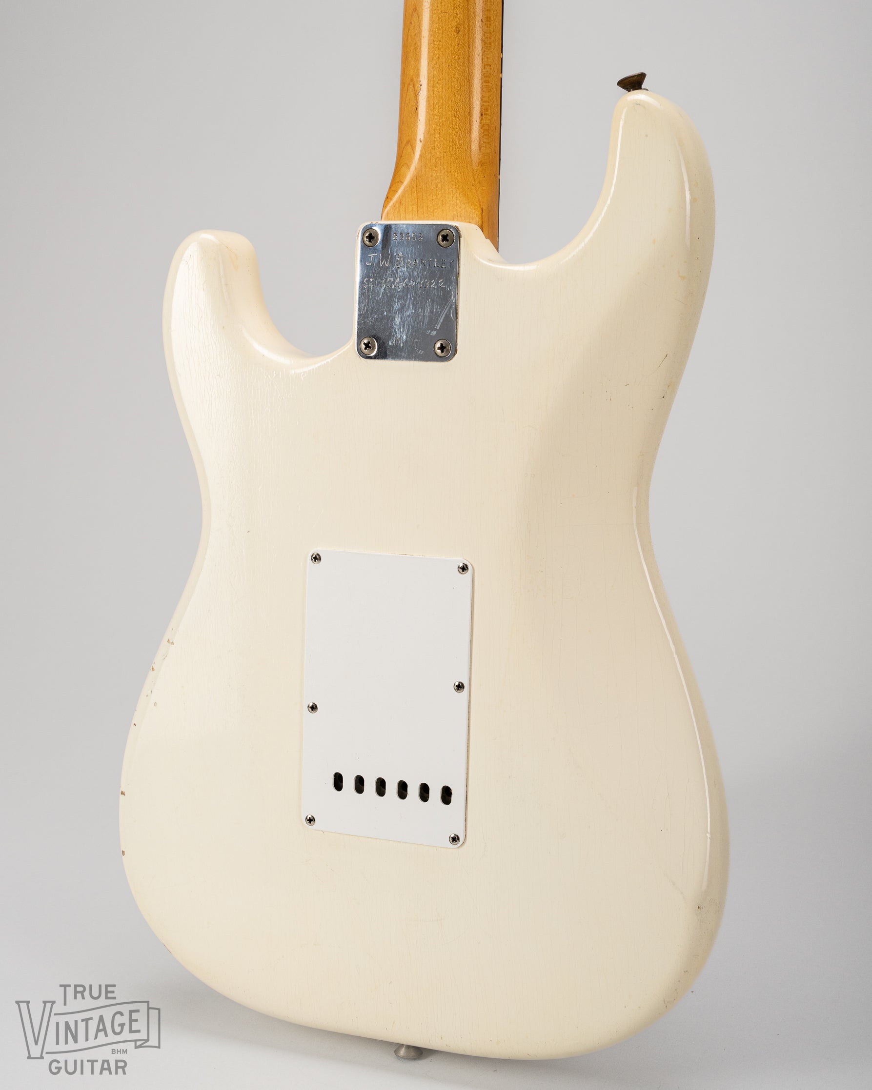 Finish checking on the back of the body of the Olympic White Stratocaster