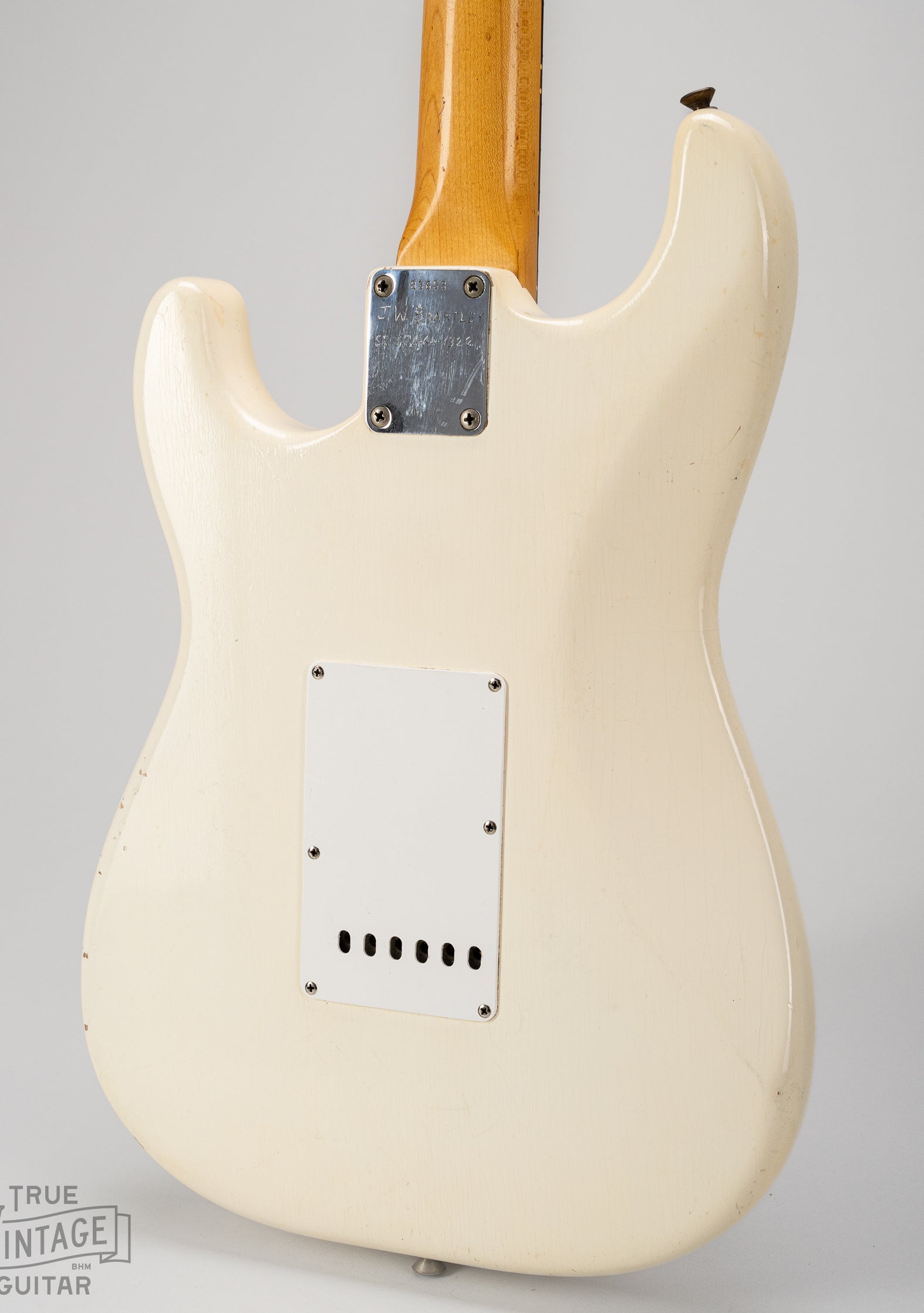 Finish checking on the back of the body of the Olympic White Stratocaster