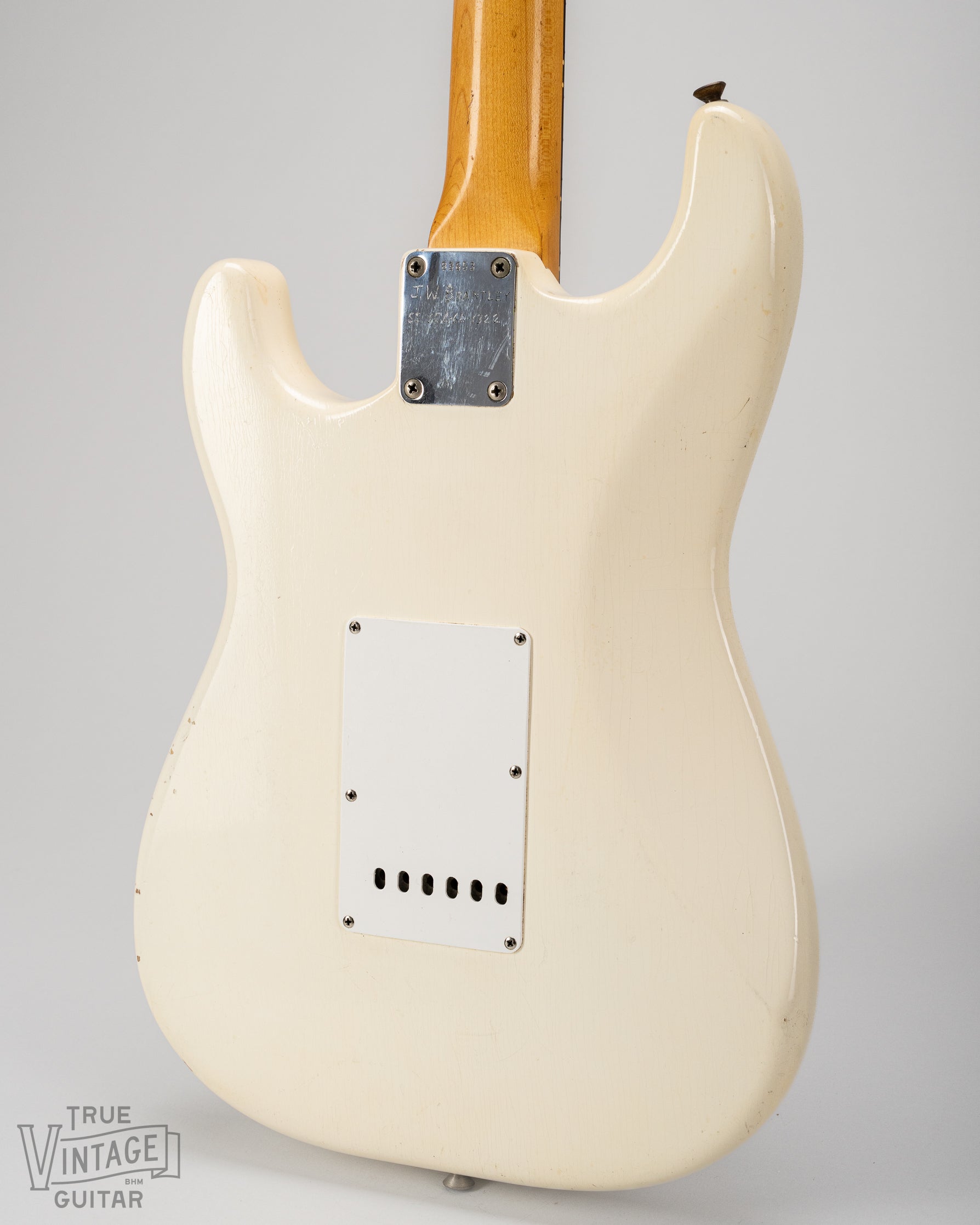 Finish checking on the back of the body of the Olympic White Stratocaster