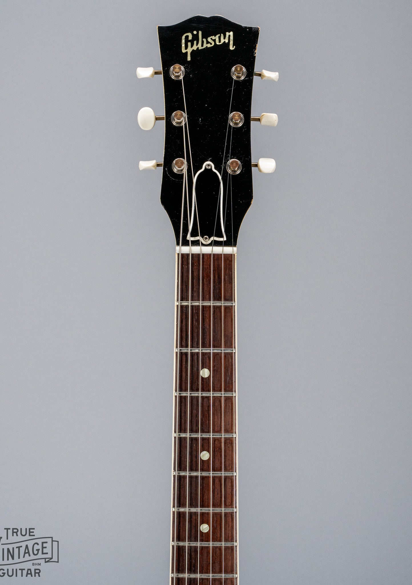 Front of 1962 Gibson SG Special white guitar neck fretboard logo tuners headstock