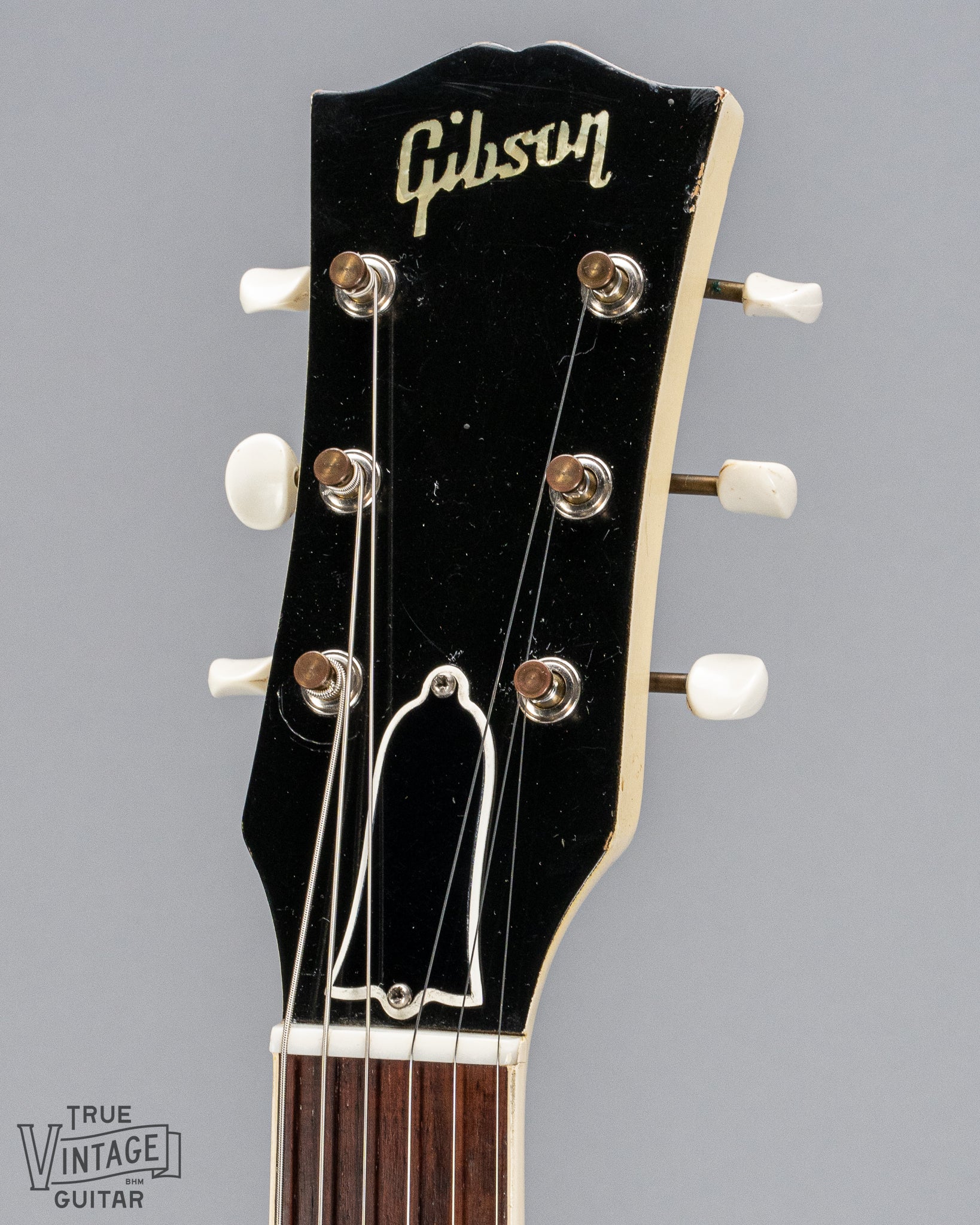 Front of 1962 Gibson SG Special white guitar headstock logo tuners