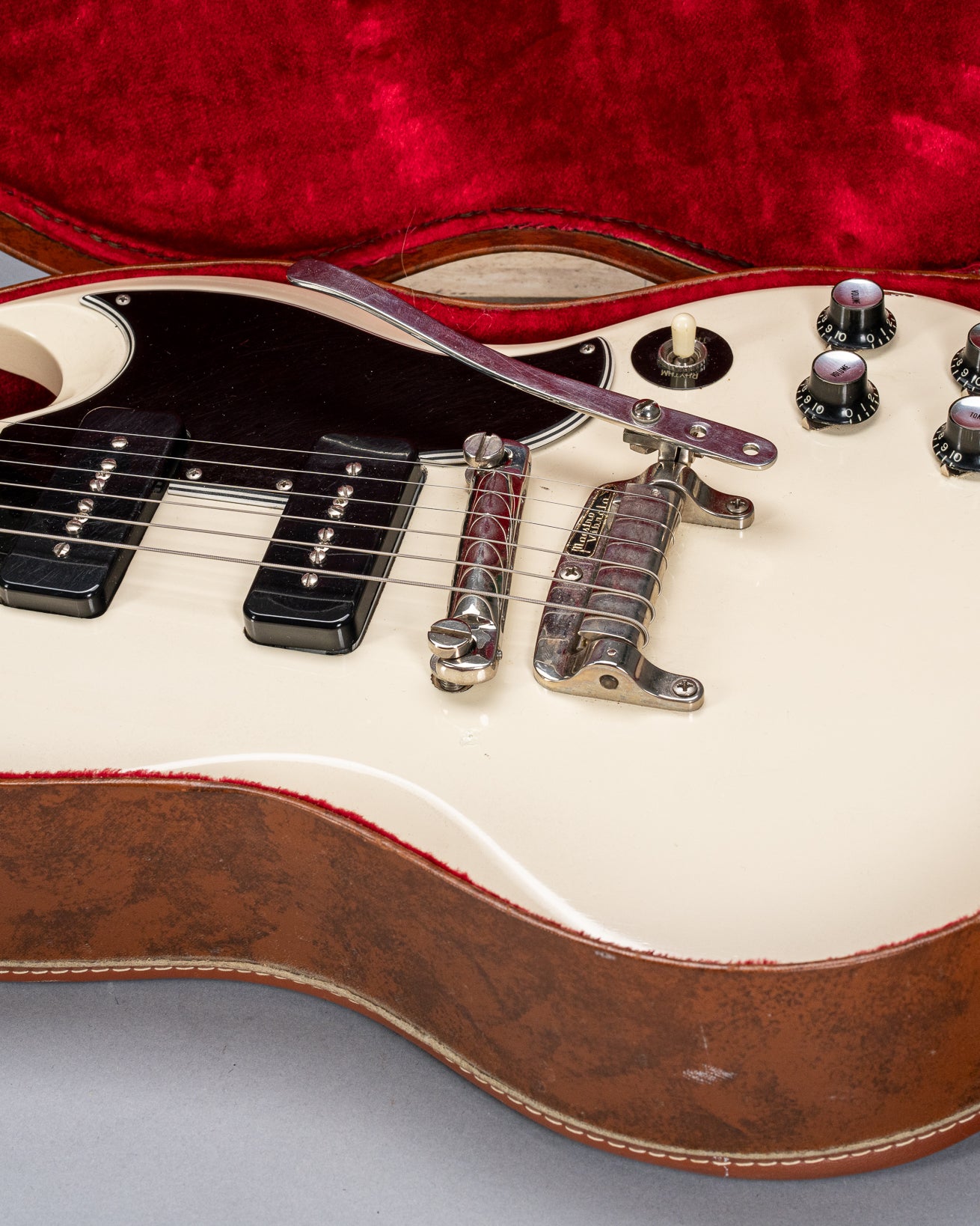 Front of 1962 Gibson SG Special white guitar body p90s maestro vibrola in Gibson hardshell case