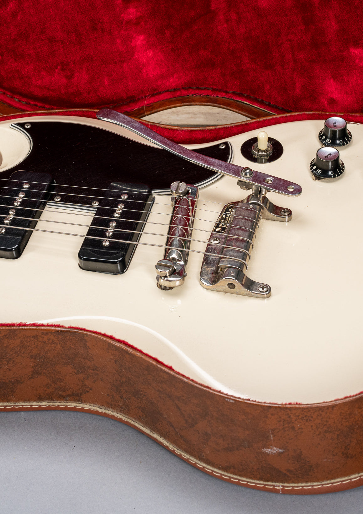 Front of 1962 Gibson SG Special white guitar body p90s maestro vibrola in Gibson hardshell case