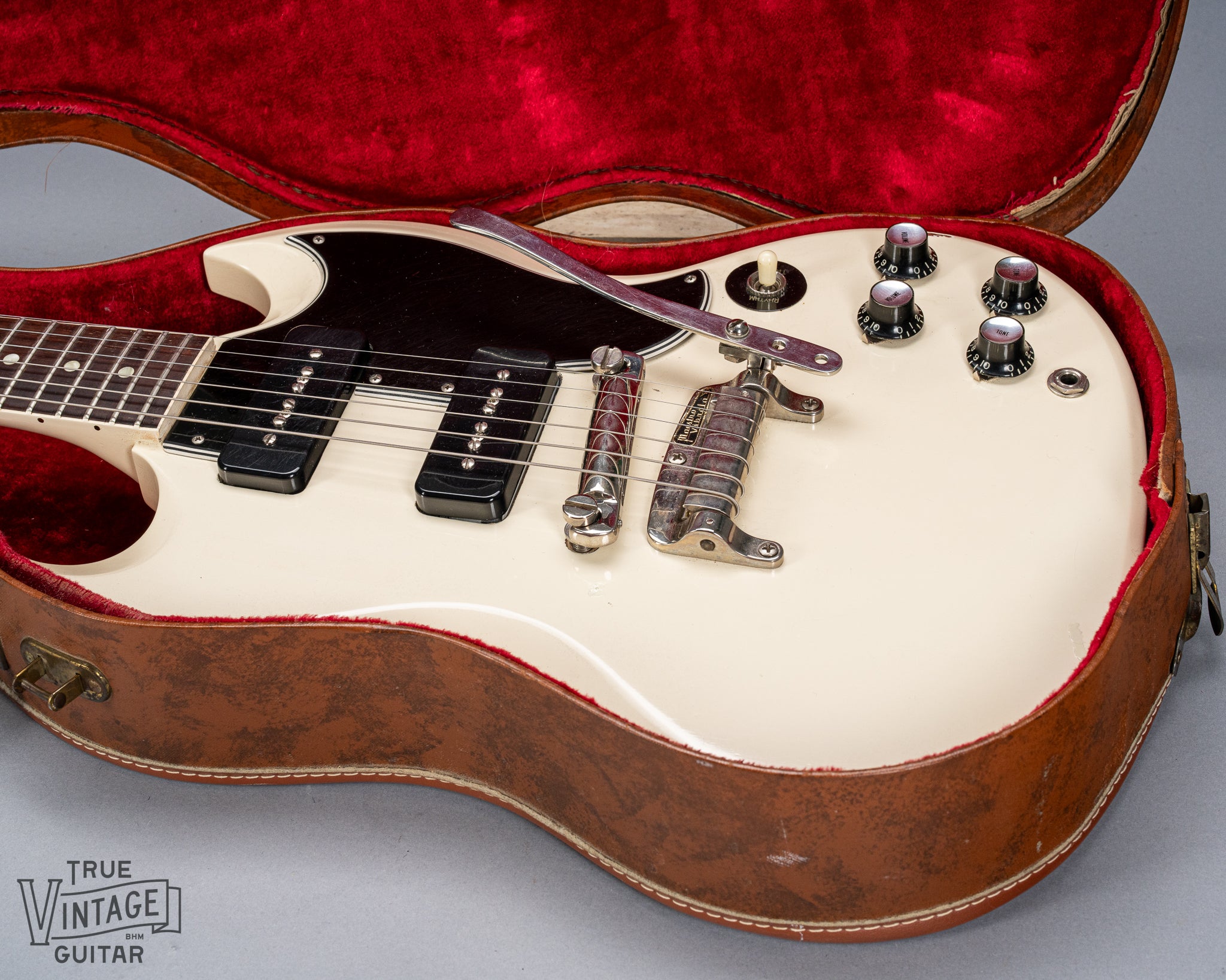 Front of 1962 Gibson SG Special white guitar body p90s maestro vibrola in Gibson hardshell case