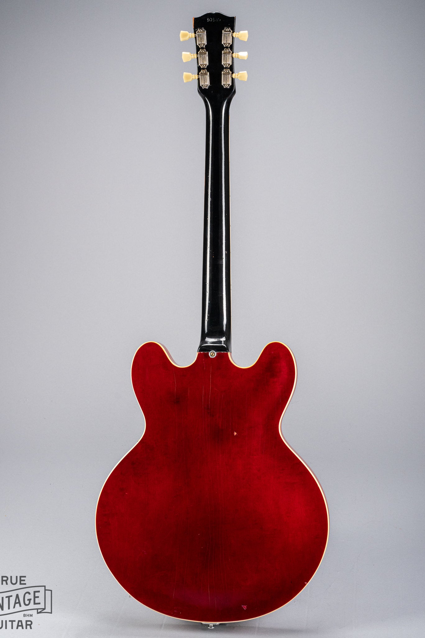 back of Gibson 1963 ES-335 Cherry red guitar body neck and headstock